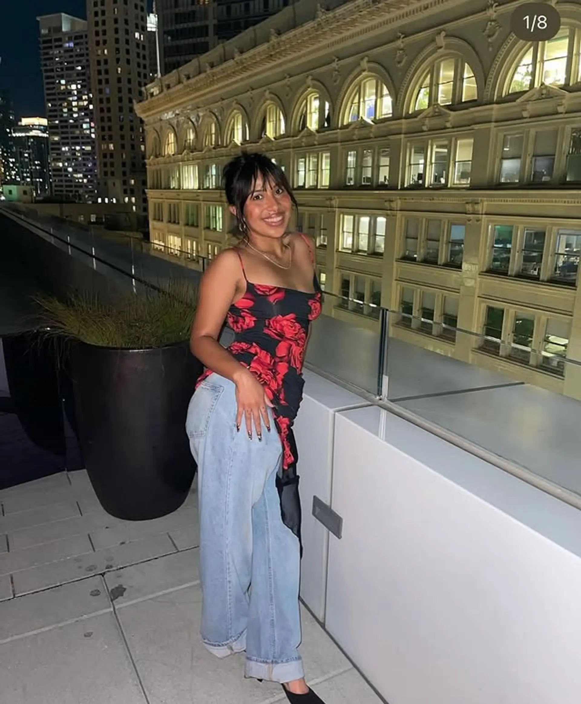 A messy bun with face-framing curtain bangs. 1