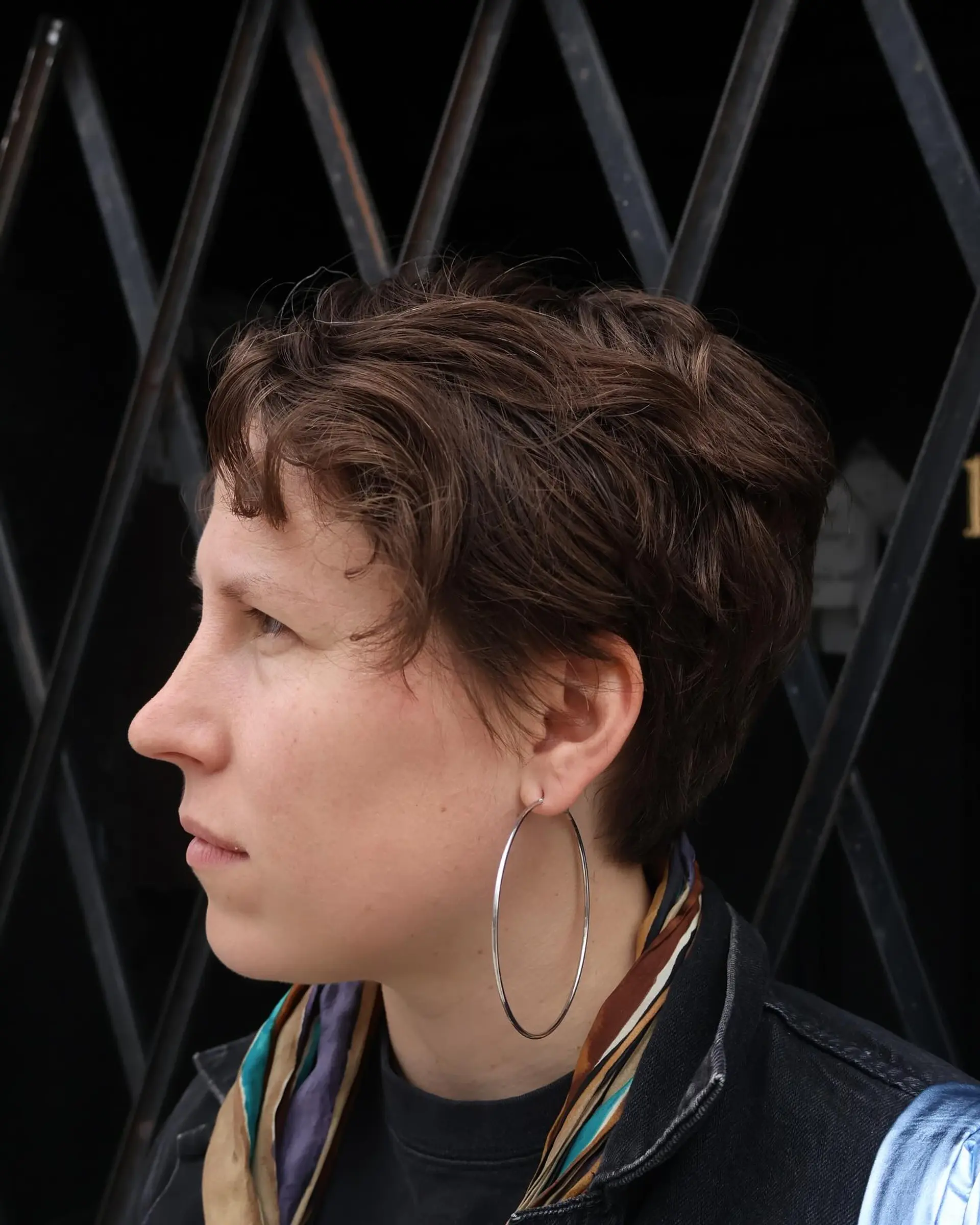 A textured pixie cut with soft waves appearance. 2