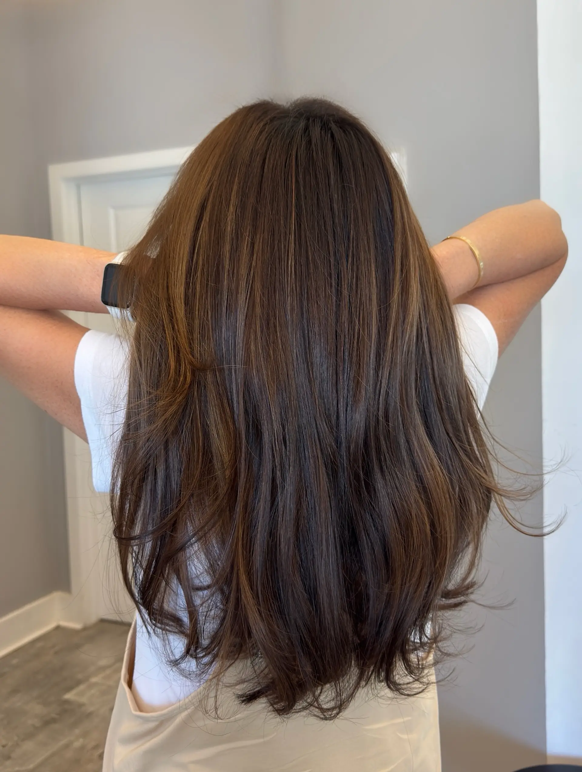 Long straight hair with bronde highlights and subtle layers. 3