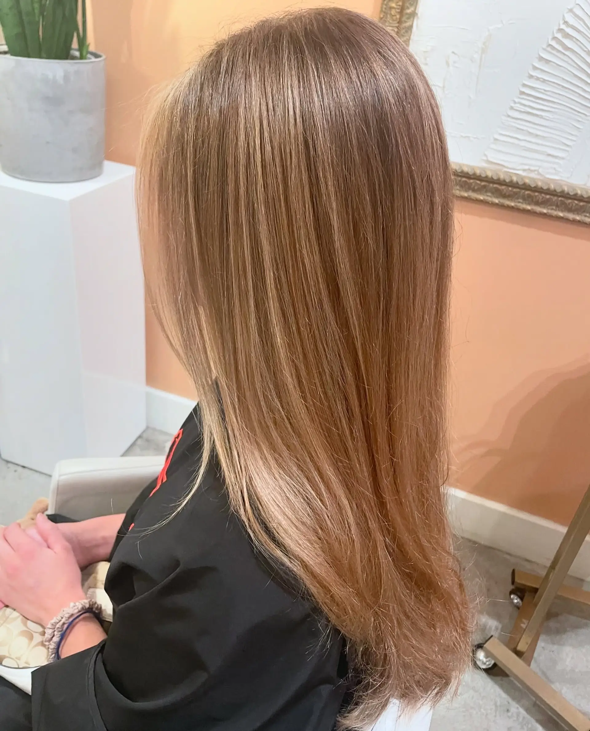Smooth, long straight hair featuring ultra-fine, seamless natural blonde highlights blended over a warm light brown base. 1