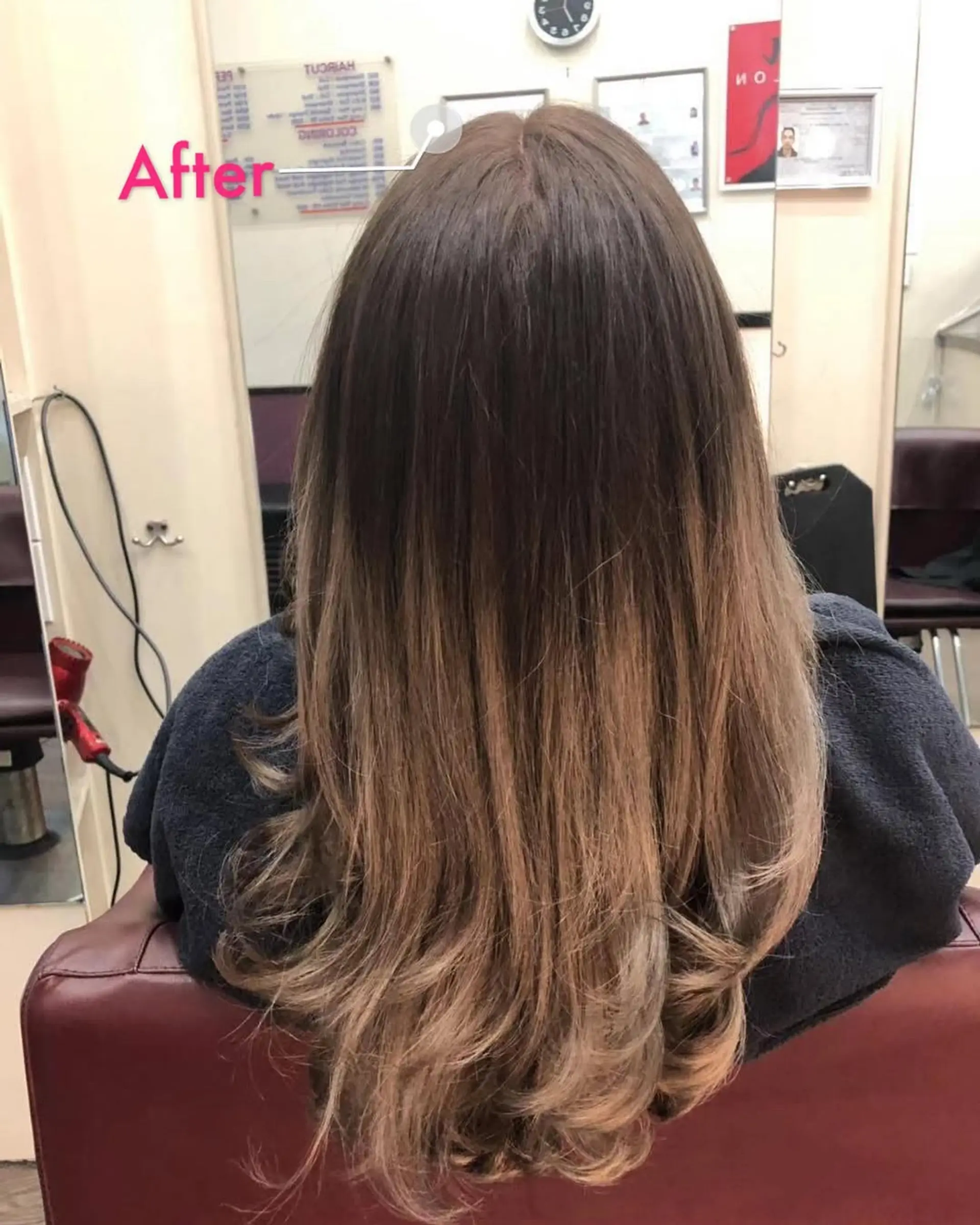 Long, layered hairstyle with a seamless brown to blonde ombre effect. 1