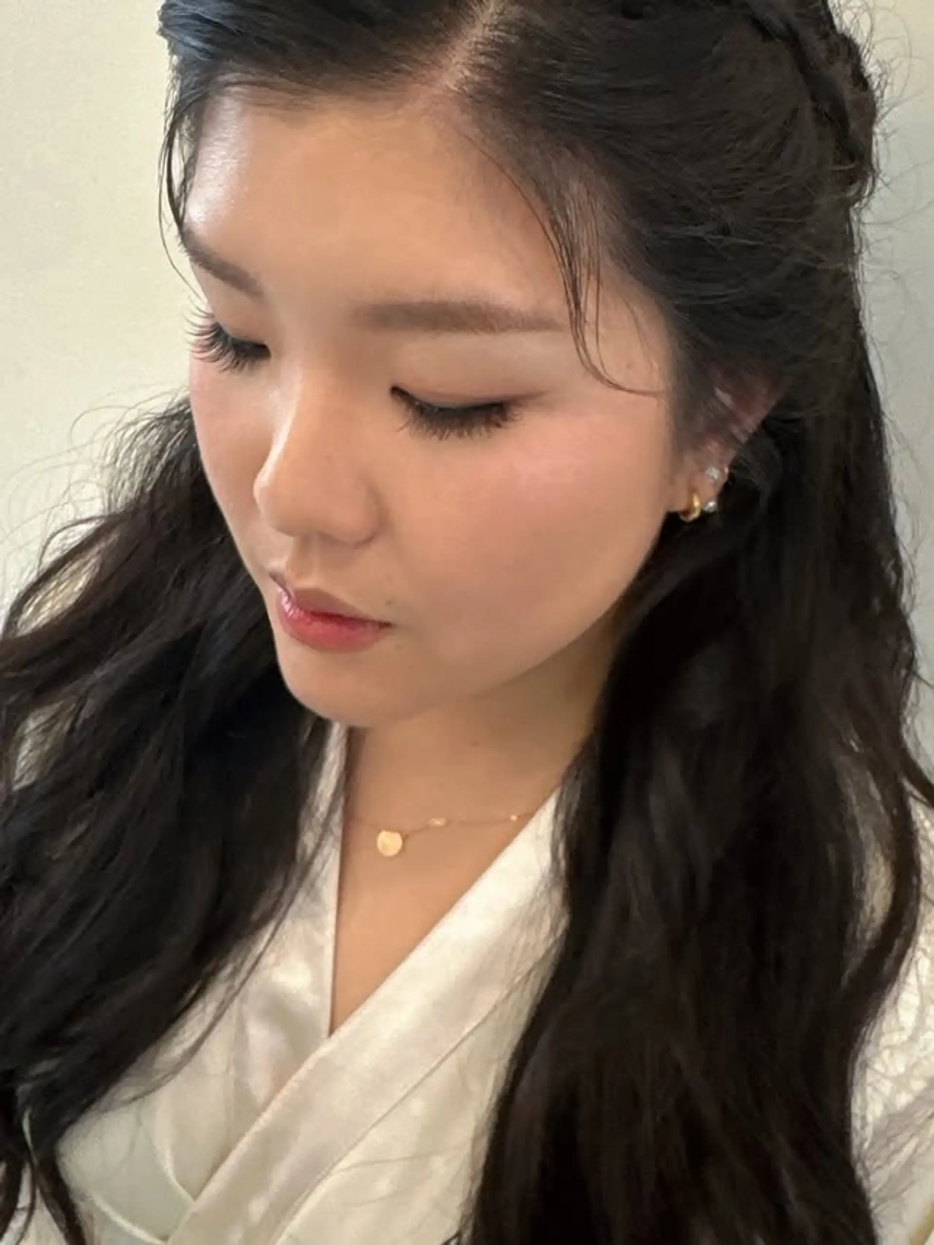 A braided half updo style where some of the hair is braided away from the face. 1