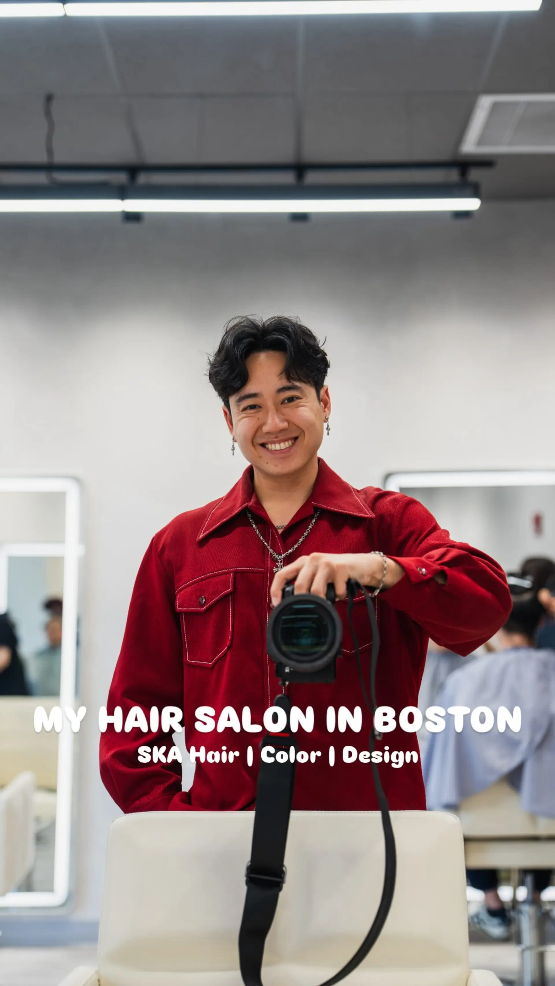 A men's short cut styled with a middle-parted, wavy curtain fringe framing the forehead. 1