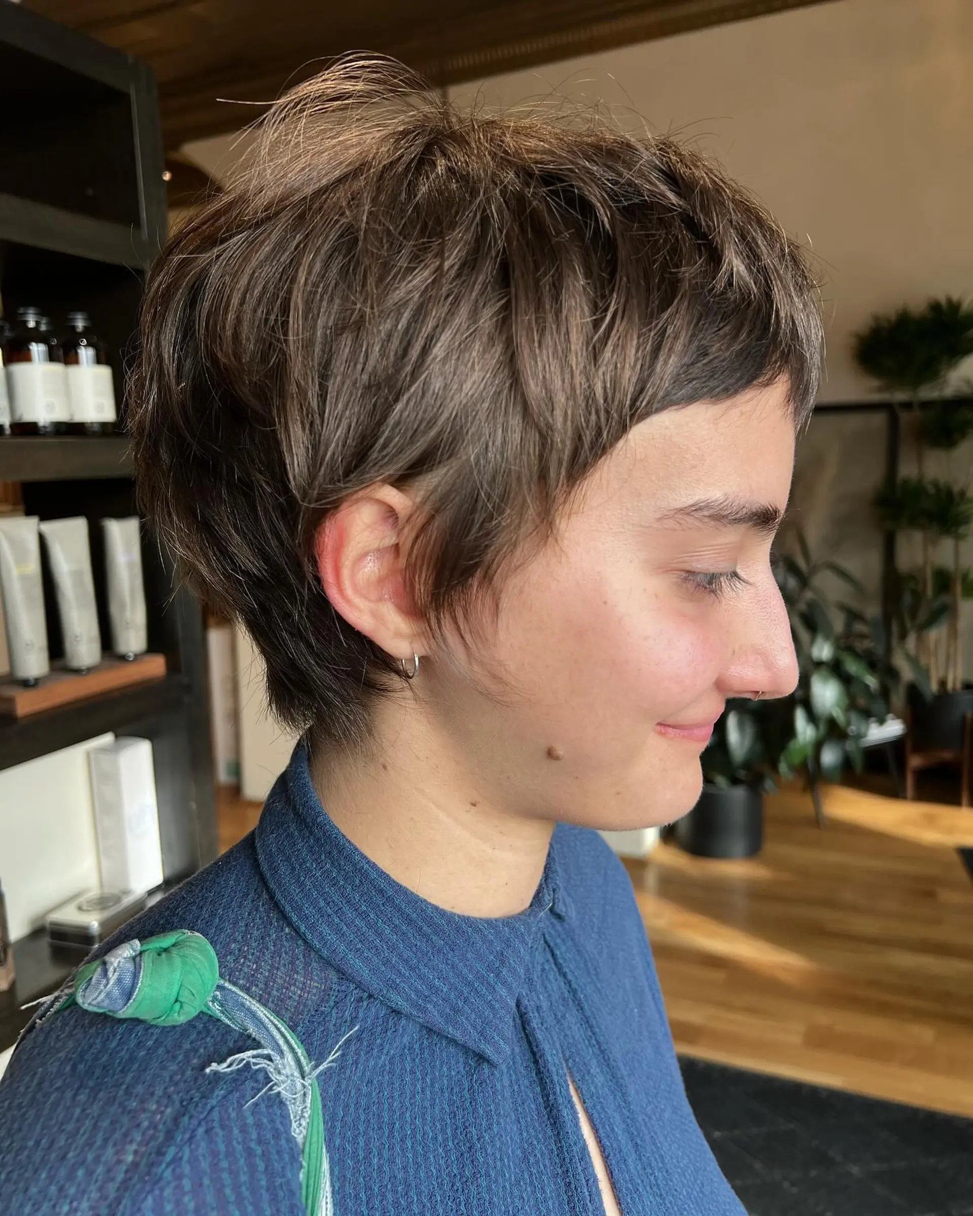 A short, textured pixie cut with choppy layers. 2