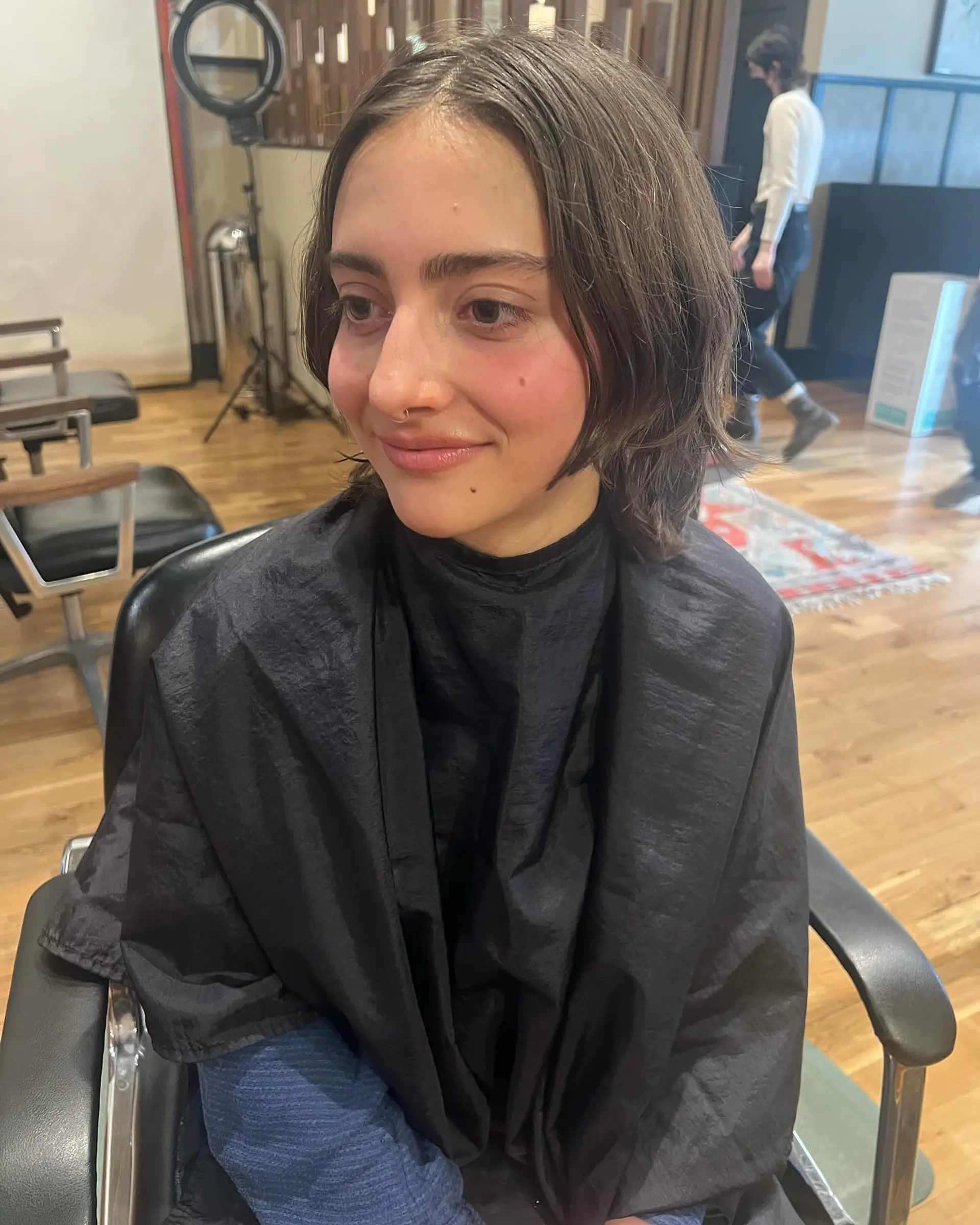 A short, textured pixie cut with choppy layers. 3