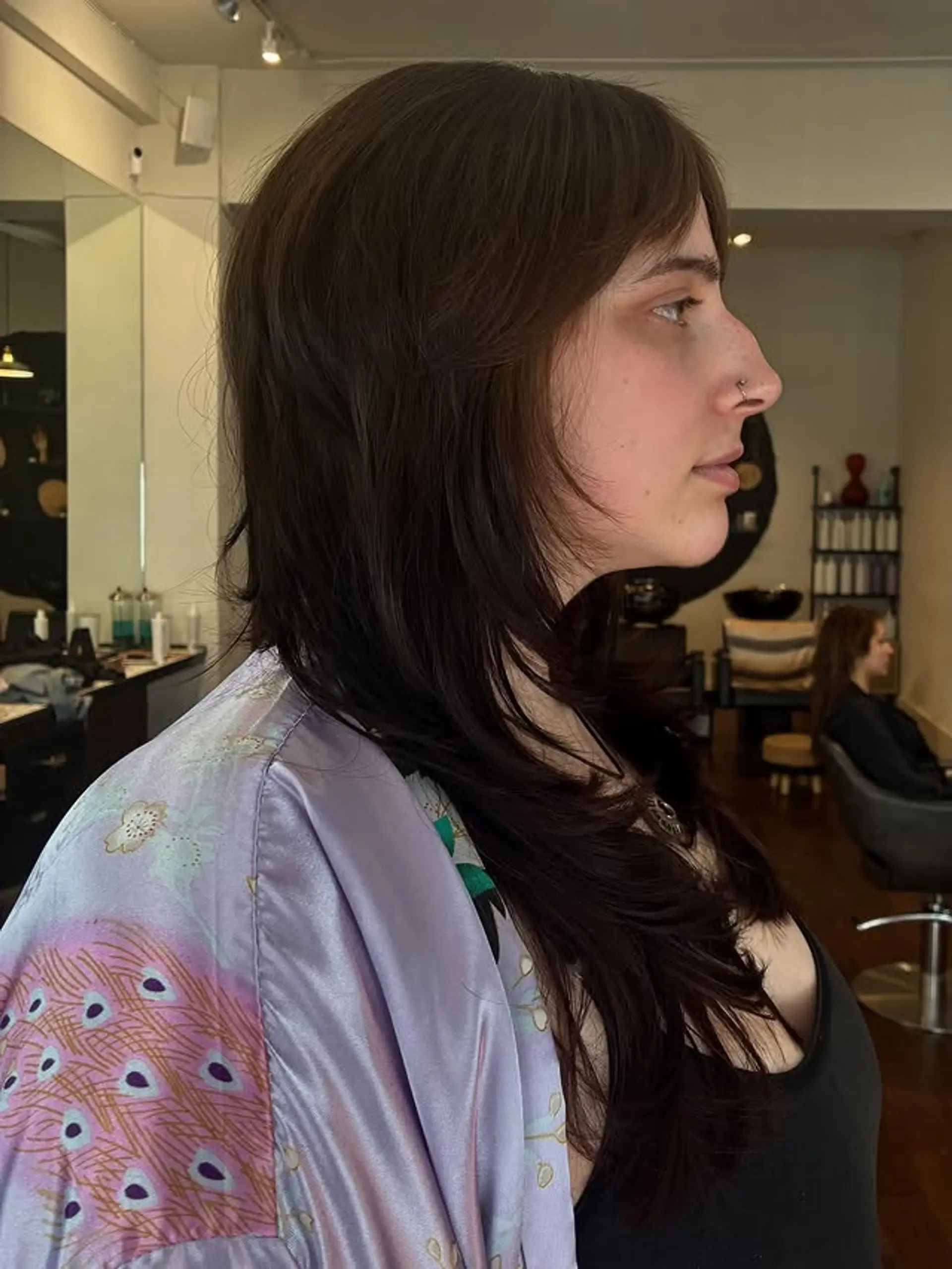 A textured shag with layers and trendy curtain bangs. 1