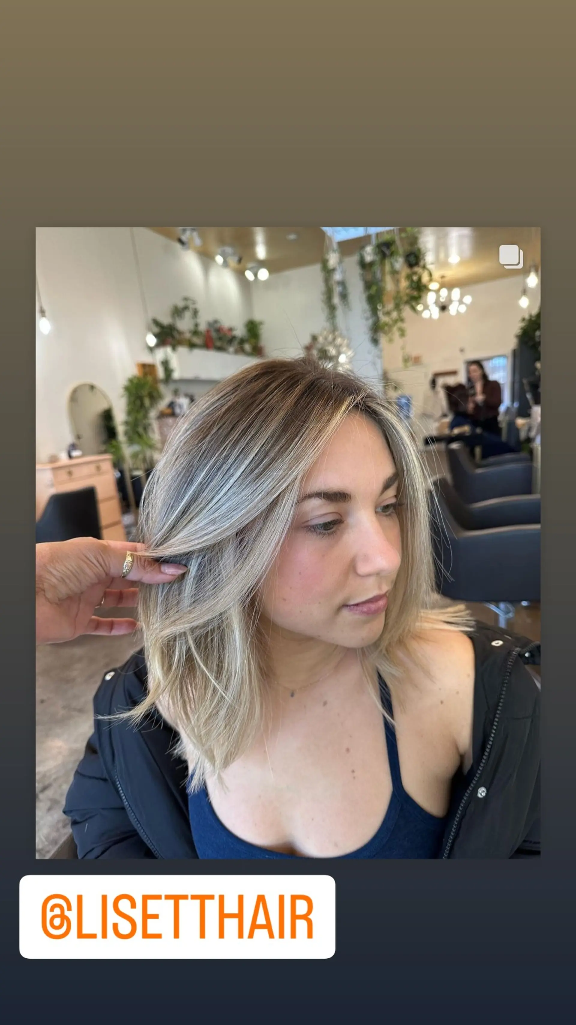 A bronde lob with subtle babylights and a soft rooted shadow root. 1