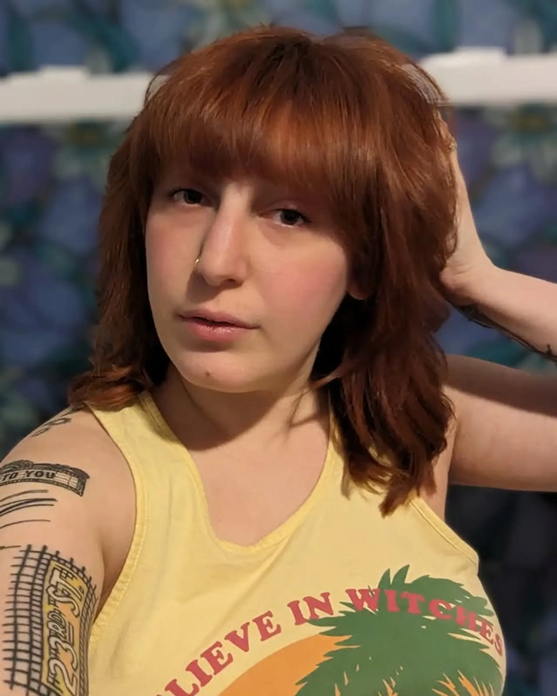 A medium-length shag with full bangs and choppy layers. 1