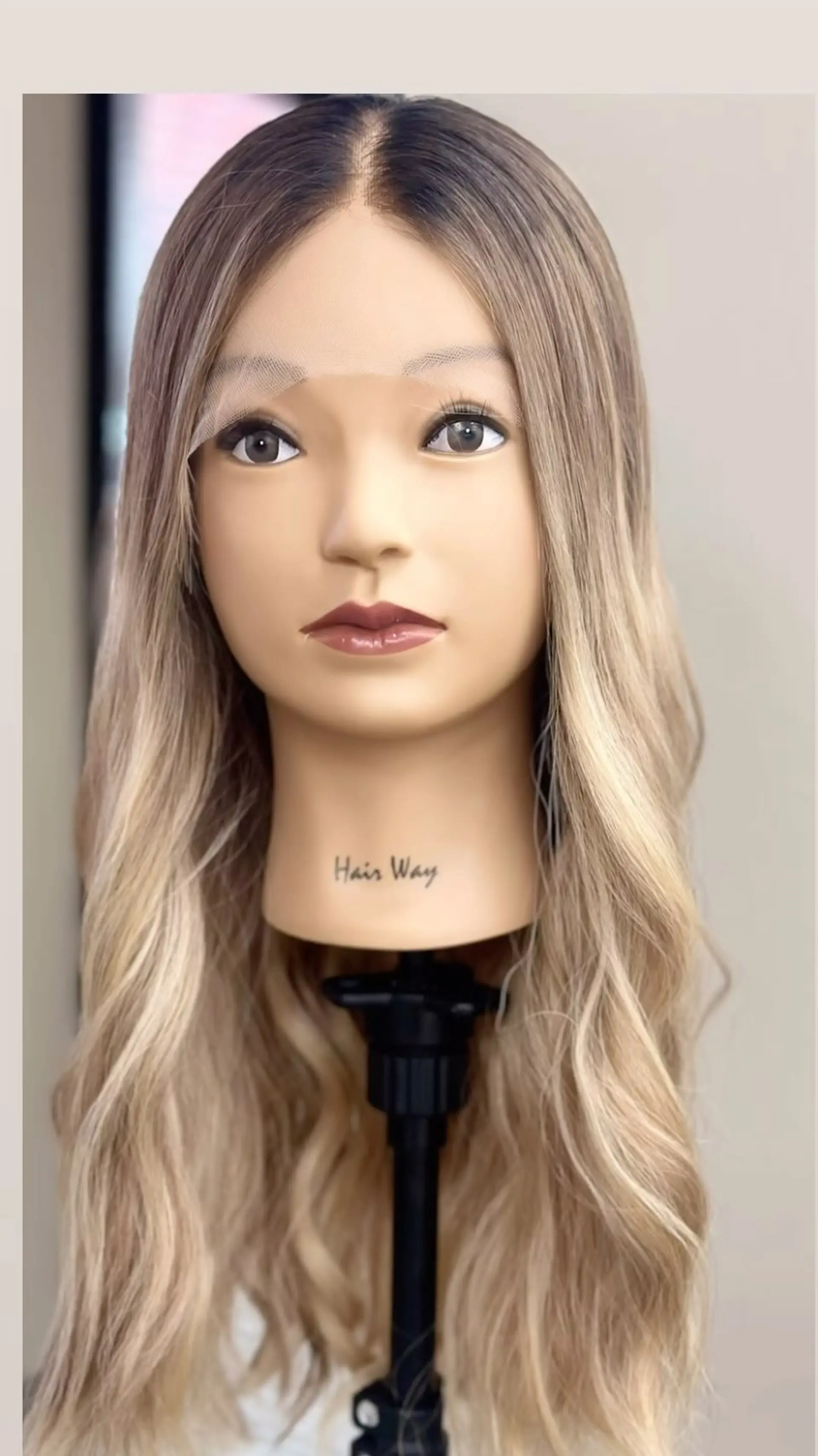 Long wavy hair with a blended dark shadow root transitioning into dimensional beige and ash blonde waves. 1