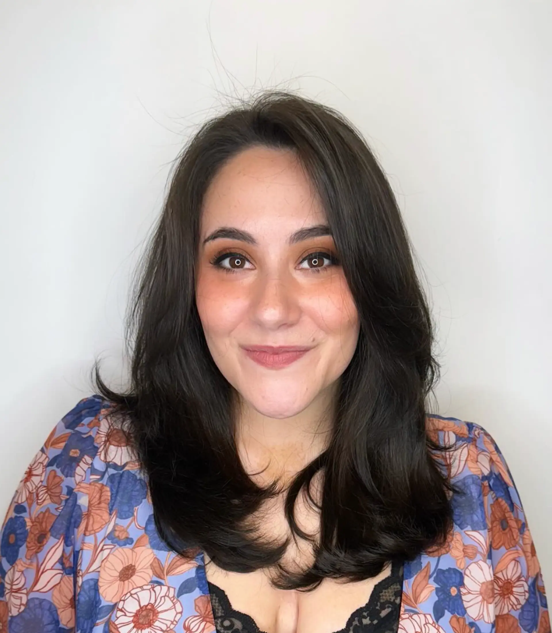 Medium-length dark brown hair with soft waves, side part, and layered for natural volume and shine.

Cut and style by @juliamannino_hair

 1