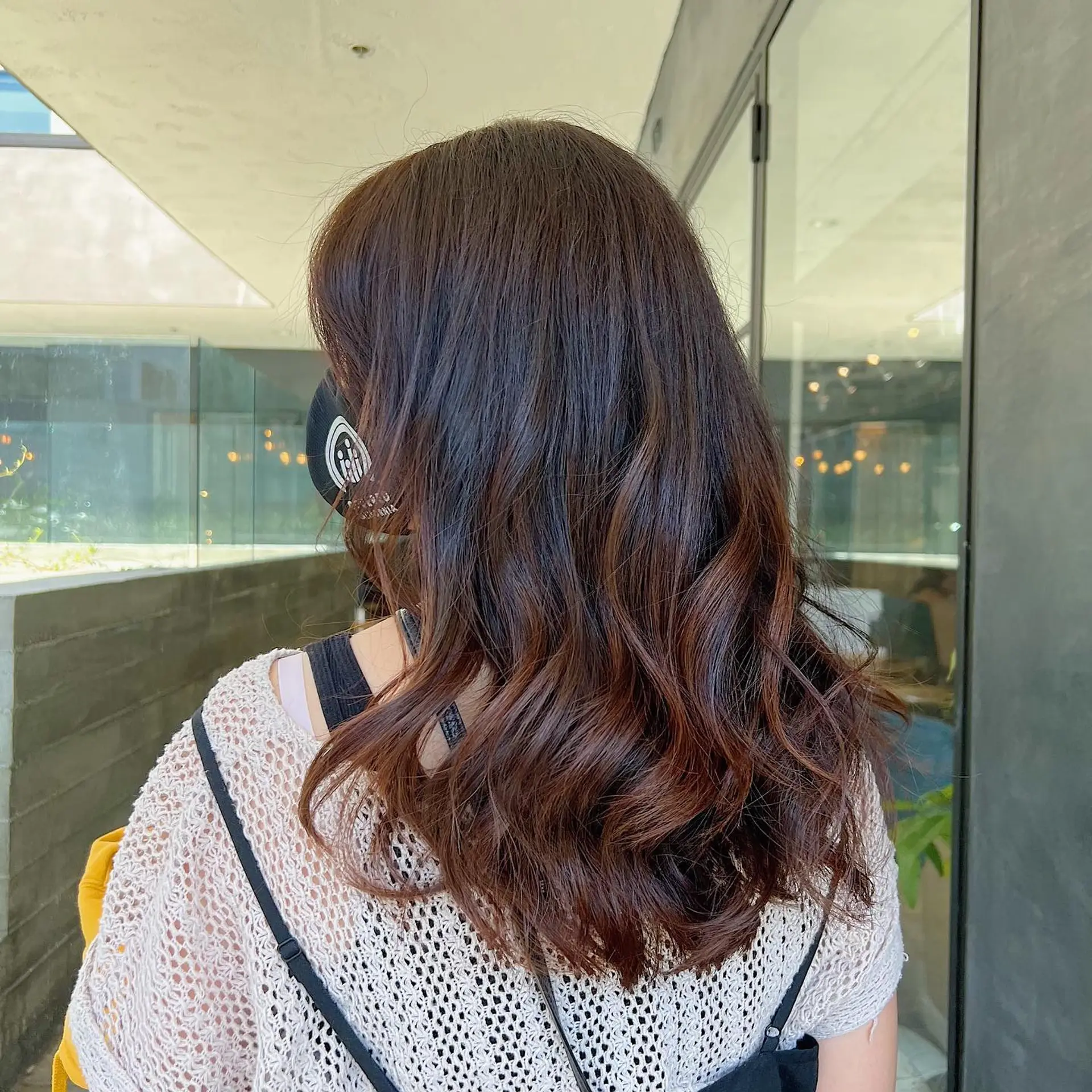 Long, wavy hair with a bronzed balayage. 2