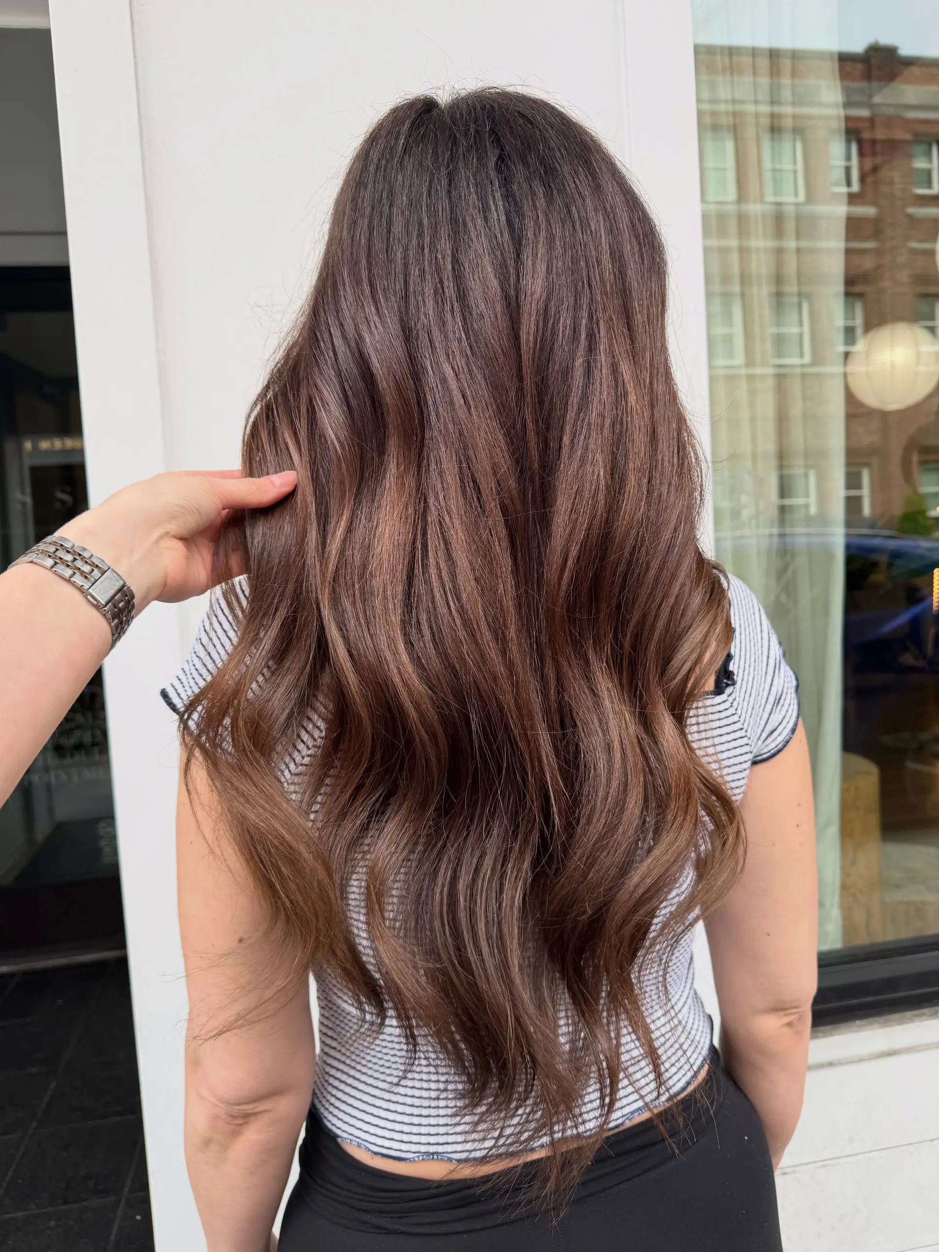 Long chocolate brunette hair styled in soft, natural waves. 1