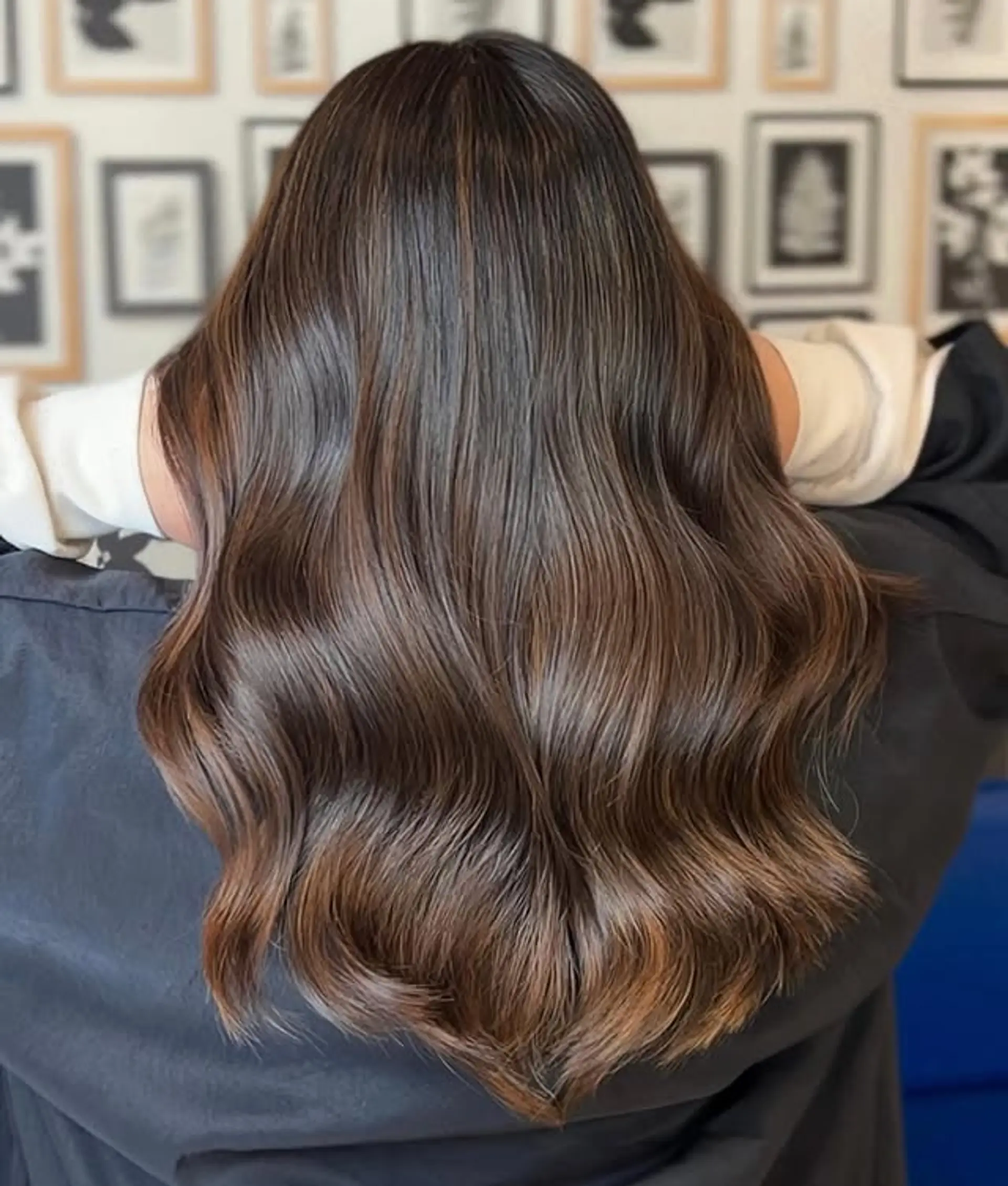 Long wavy hair with a chocolate brunette balayage. 1