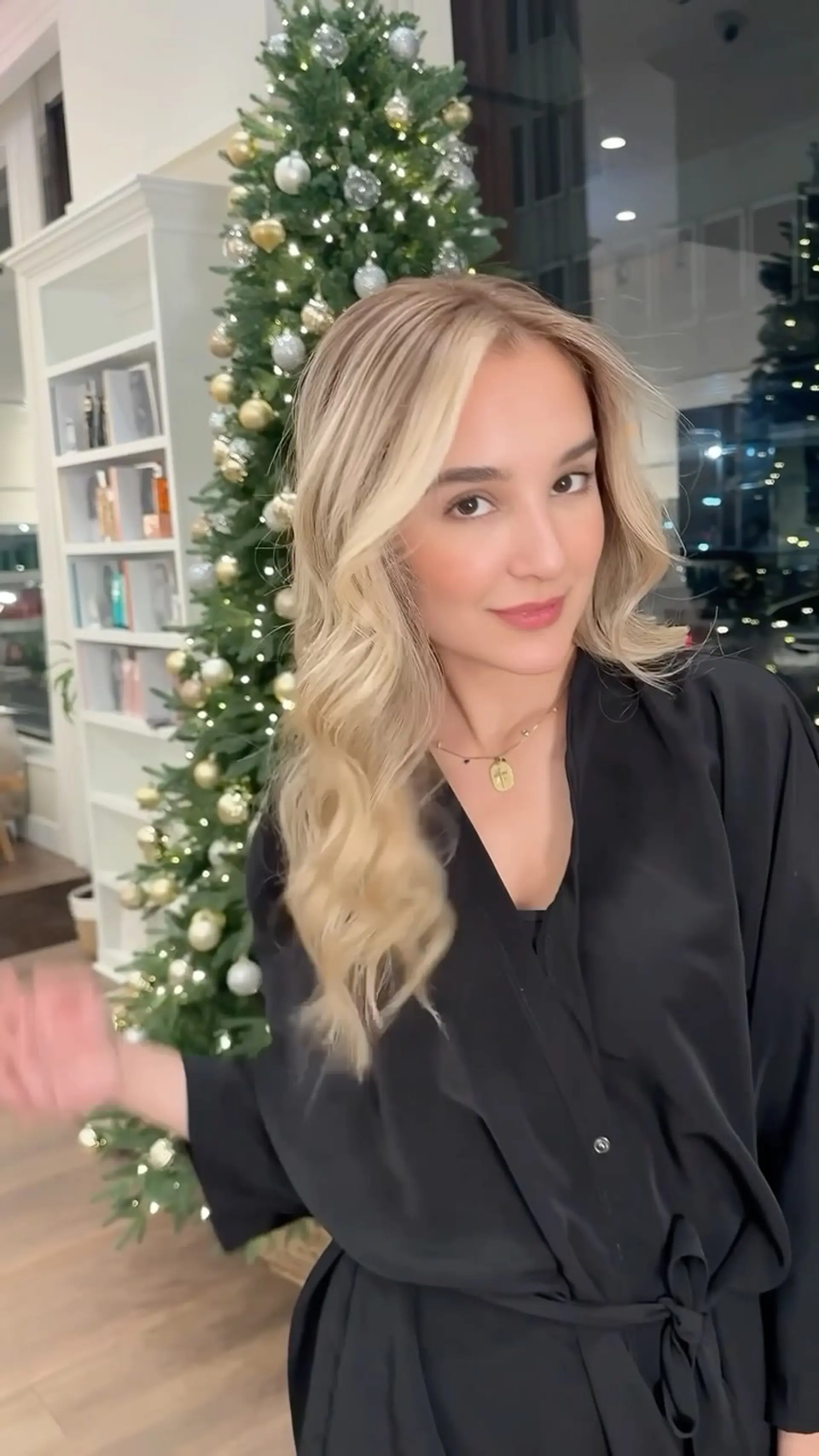 Long blonde hair styled into soft, flowing loose waves with bright face-framing highlights and a natural shadow root. 1