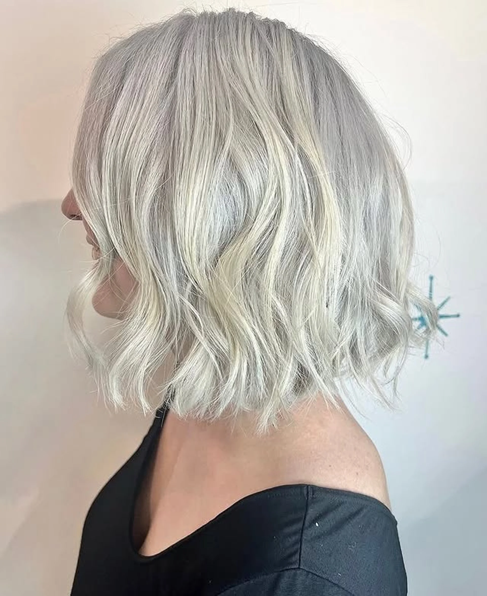 A glamorous wavy bob with dimensional layers, defining the 2026 Riviera Bob trend. - Preview 3
