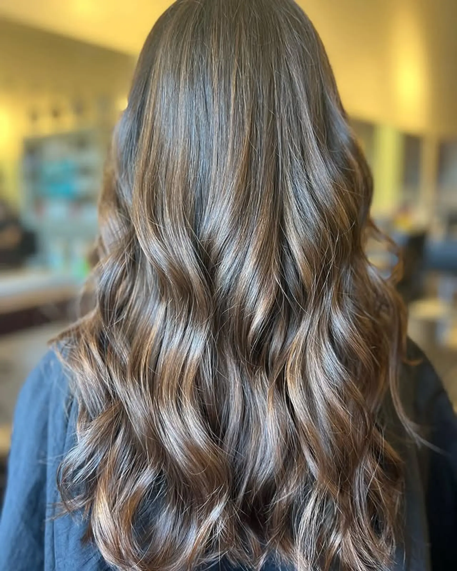 Long wavy hair with a caramel balayage. 1