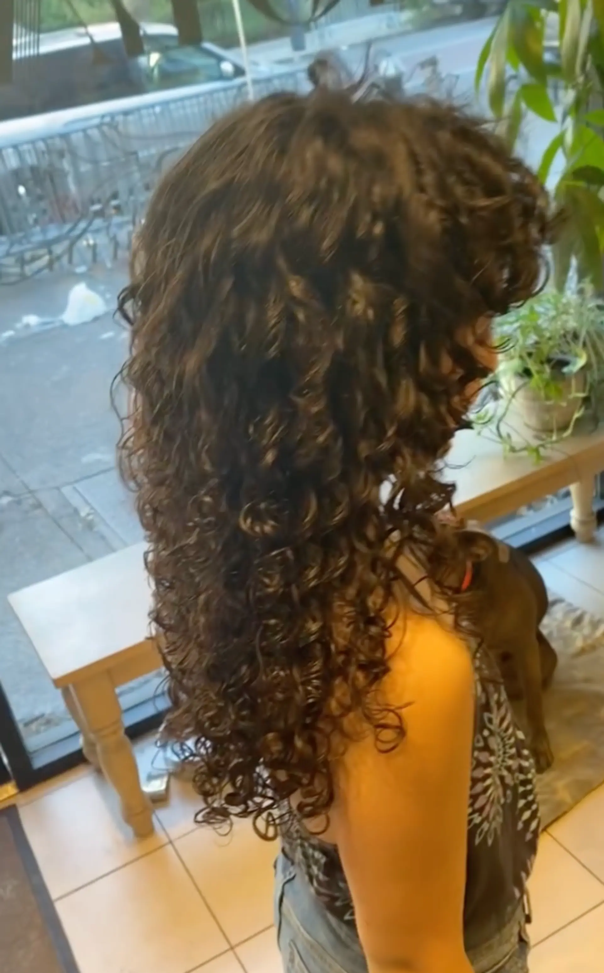 A long curly hairstyle with defined spiral curls. 1