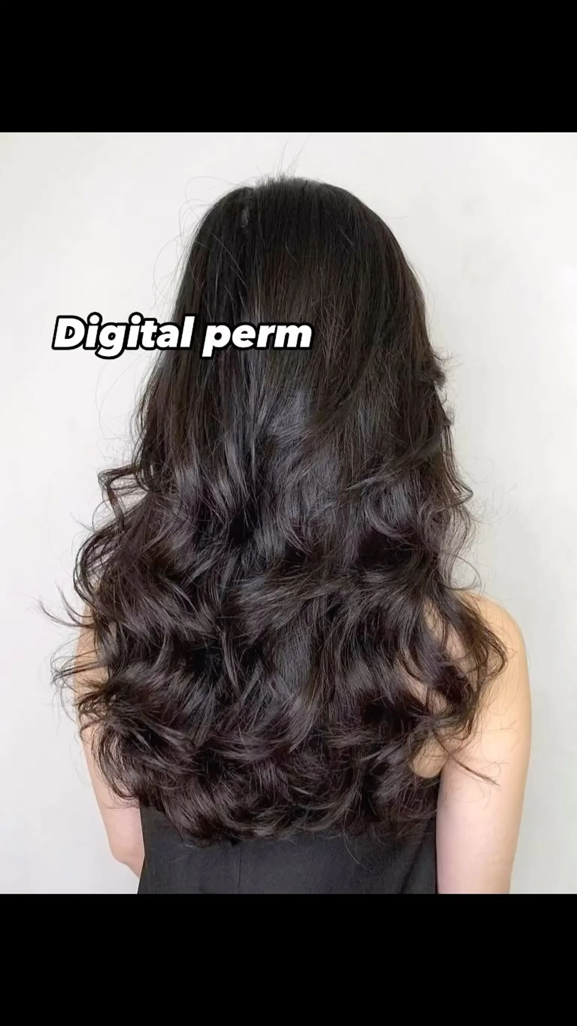 Long, voluminous dark hair styled with cascading, soft digital perm waves and layered movement. 1