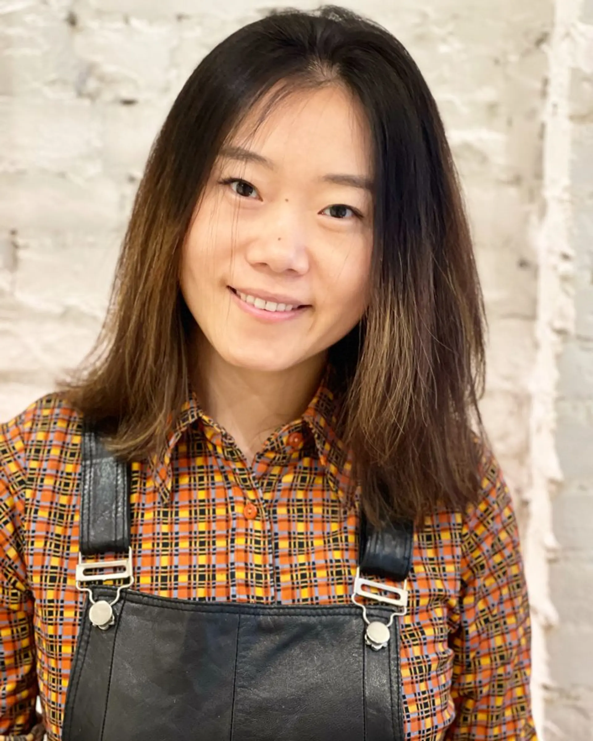 A sleek, layered lob with an ombre color transition. 1