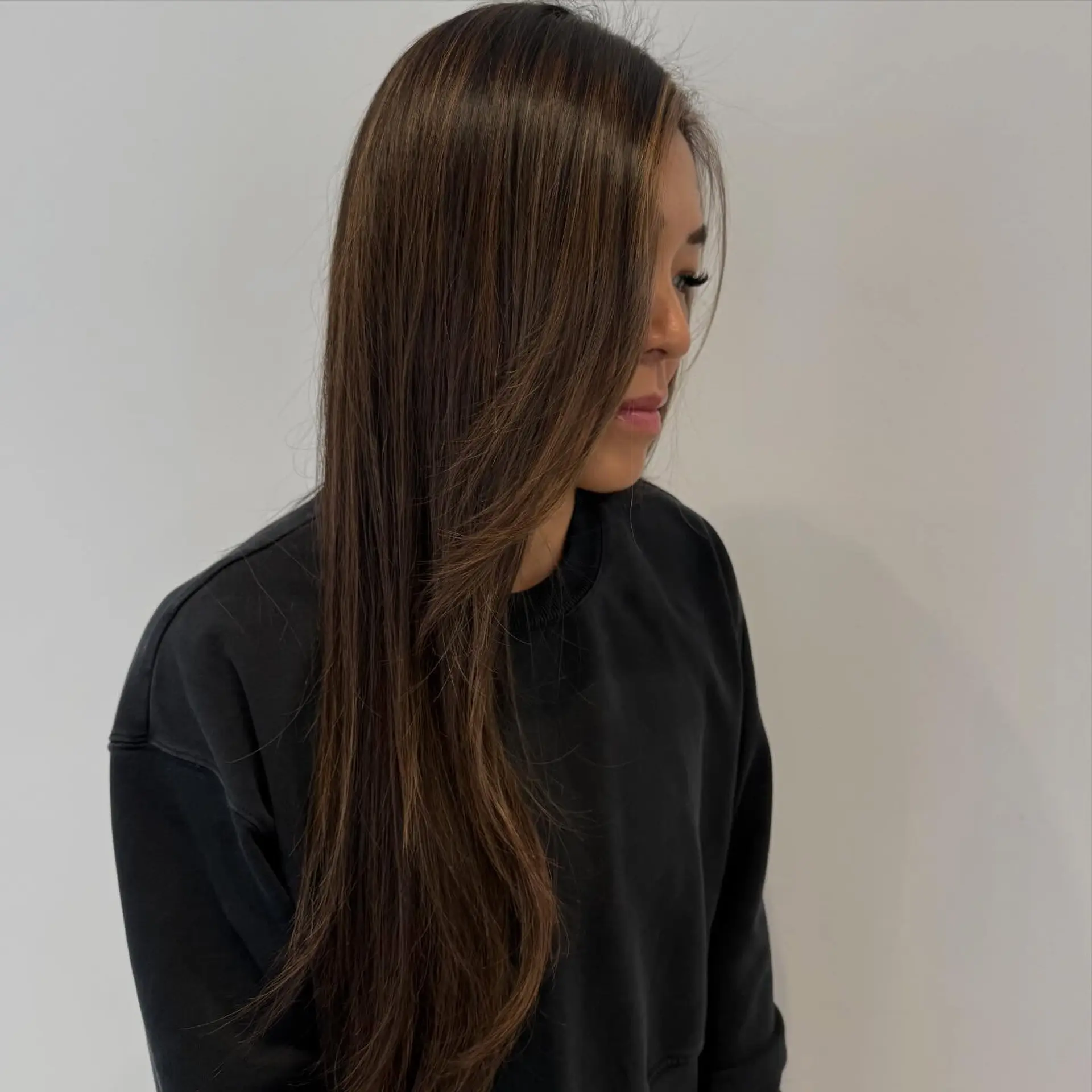 Long straight dark brown hair with fine, soft brown balayage highlights throughout. 1