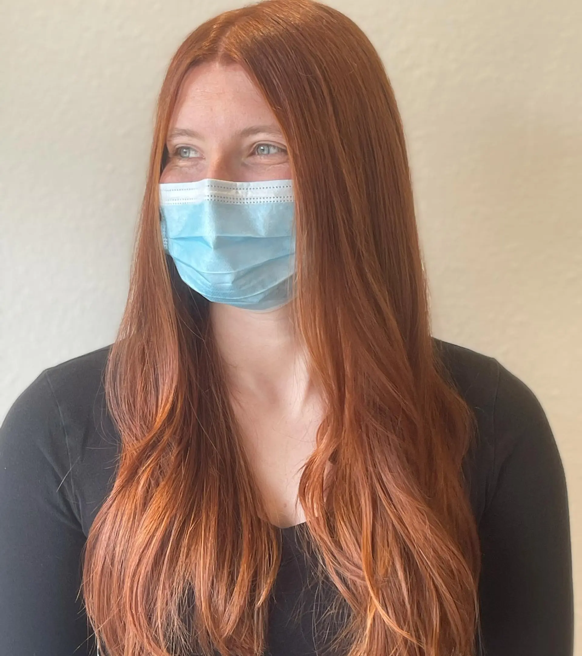 Long, vibrant cowboy copper hair styled with a center part and soft, natural movement through the ends. 1