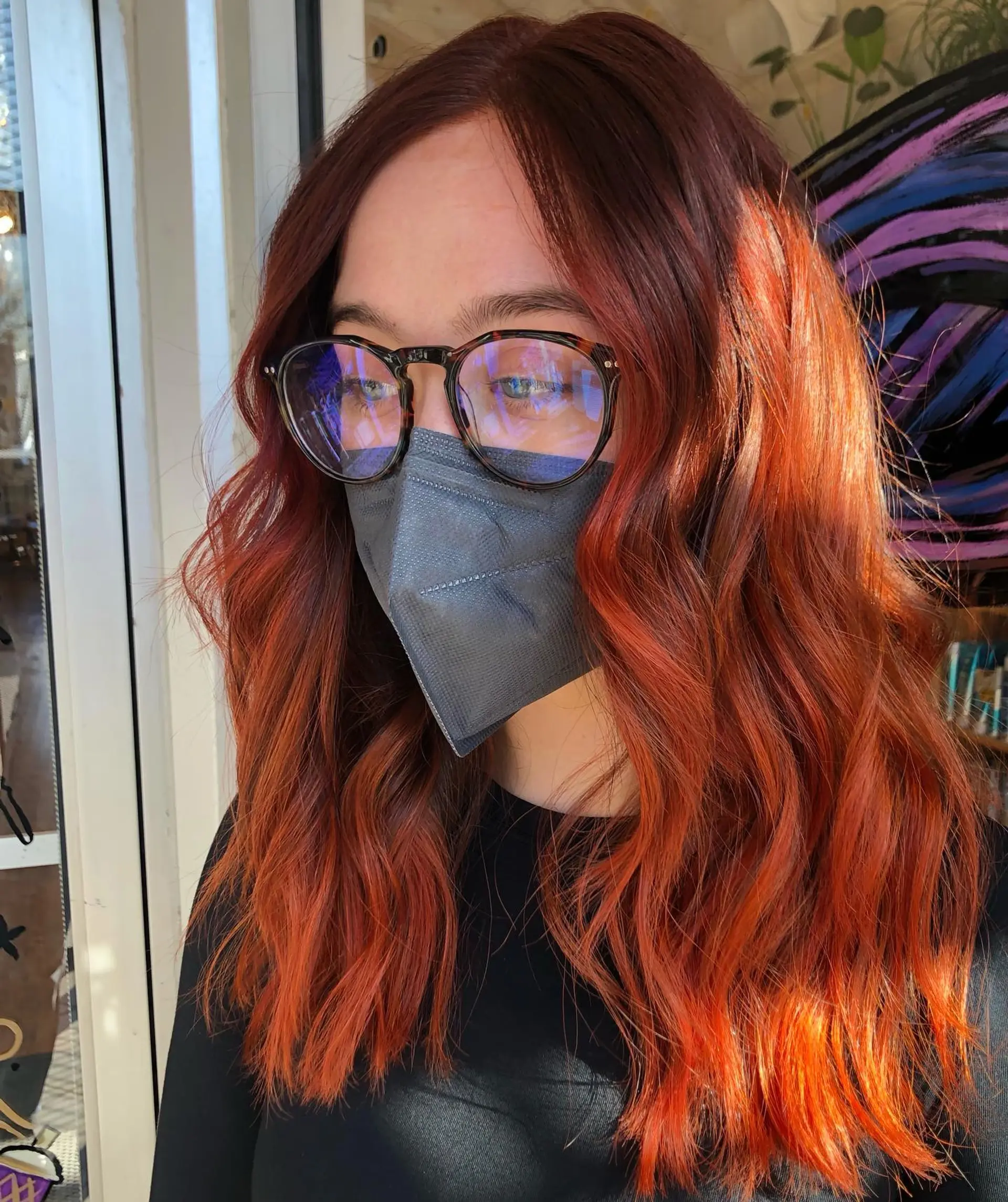 A vibrant ginger copper hairstyle with soft, loose waves that cascade around the shoulders. 1