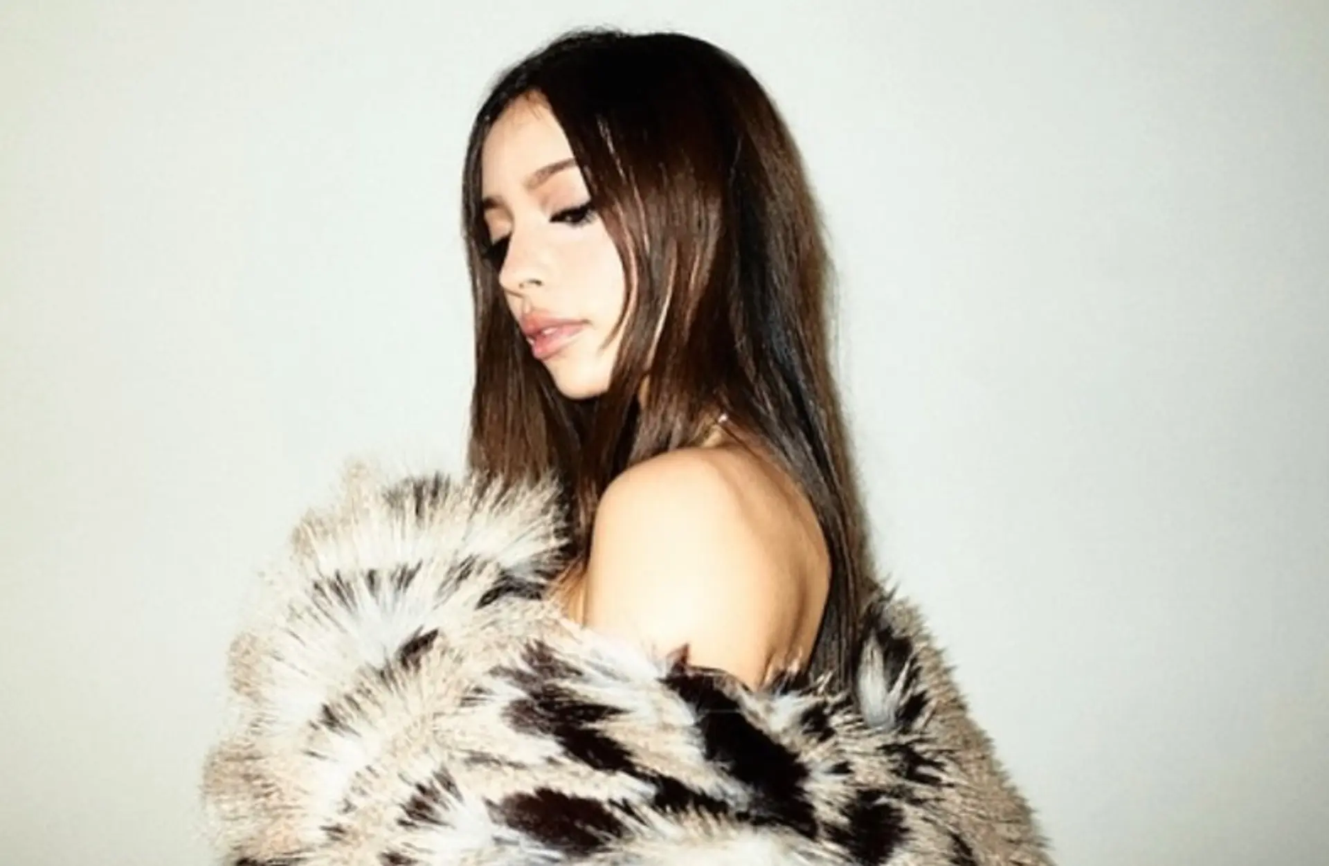 Long, sleek dark brown hair styled smooth and straight with a high-shine finish. 1