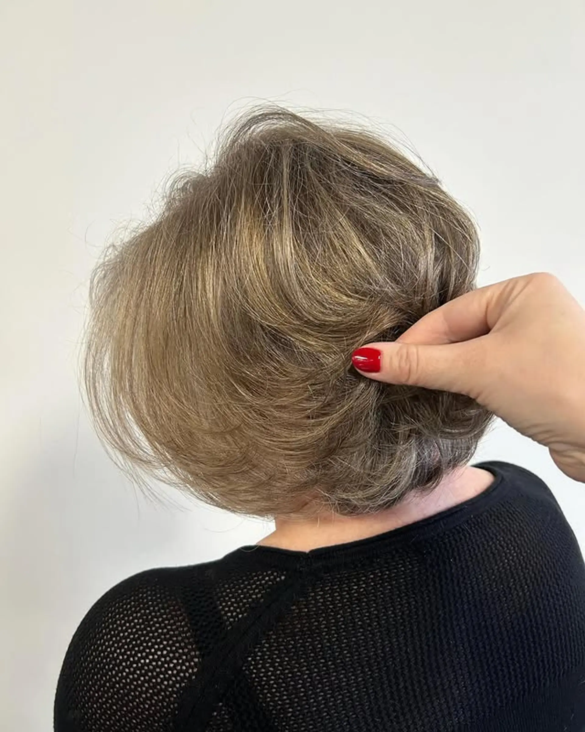 A short, layered bob that offers texture and easy styling. 1