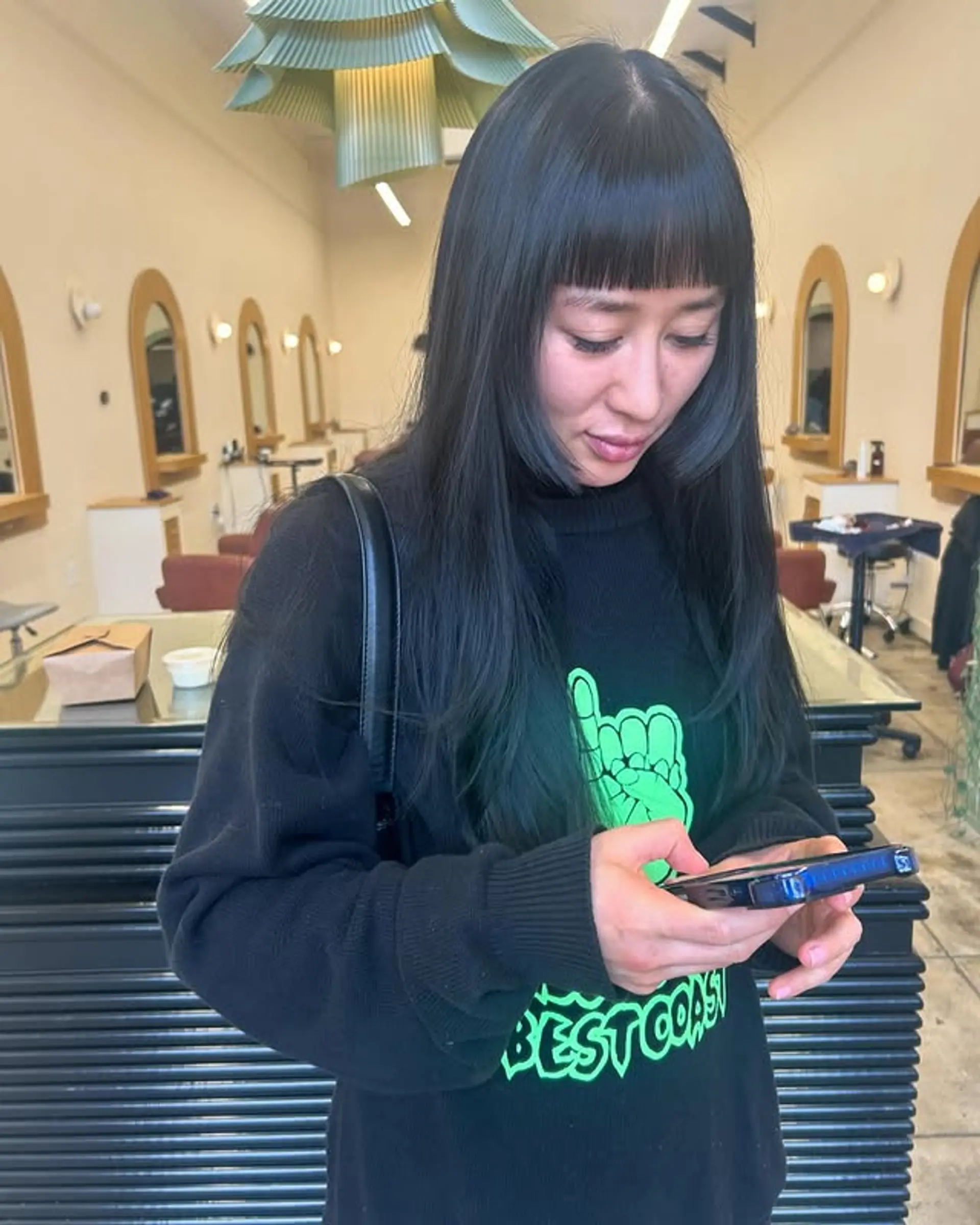 A layered shag with short baby bangs. 1