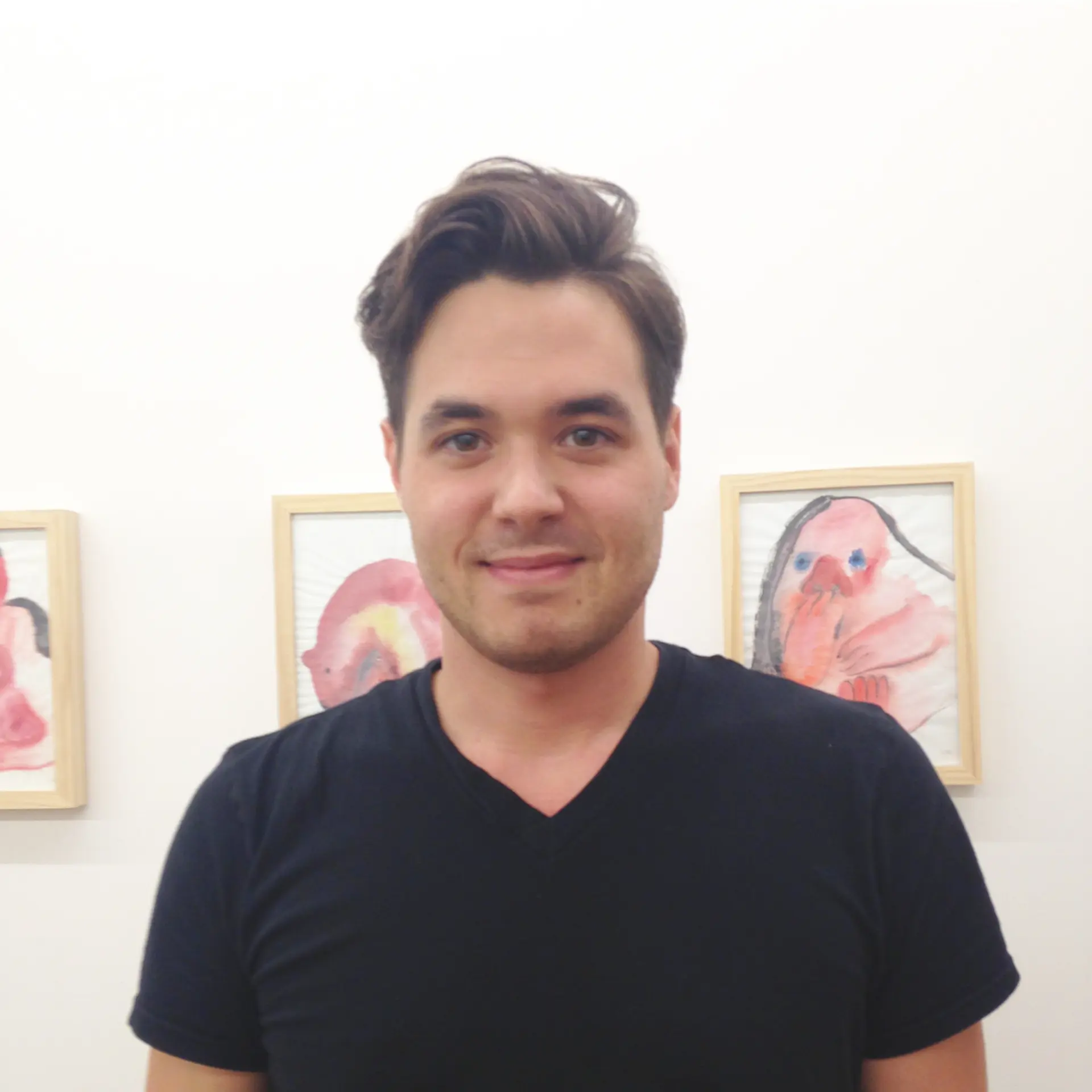 The hair is dark brown, wavy, and short, featuring a distinct side part with natural volume, creating a slightly messy yet controlled look. Clean lines around the edges add sophistication. 1