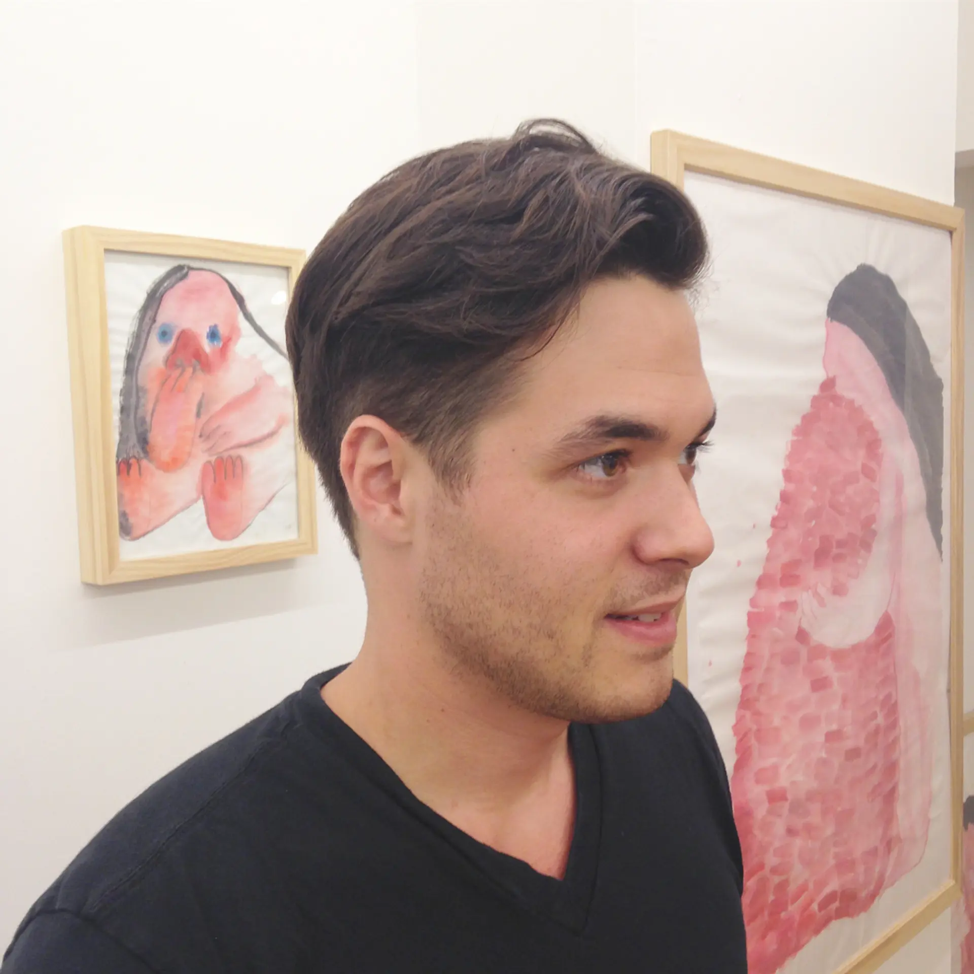 The hair is dark brown, wavy, and short, featuring a distinct side part with natural volume, creating a slightly messy yet controlled look. Clean lines around the edges add sophistication. 2