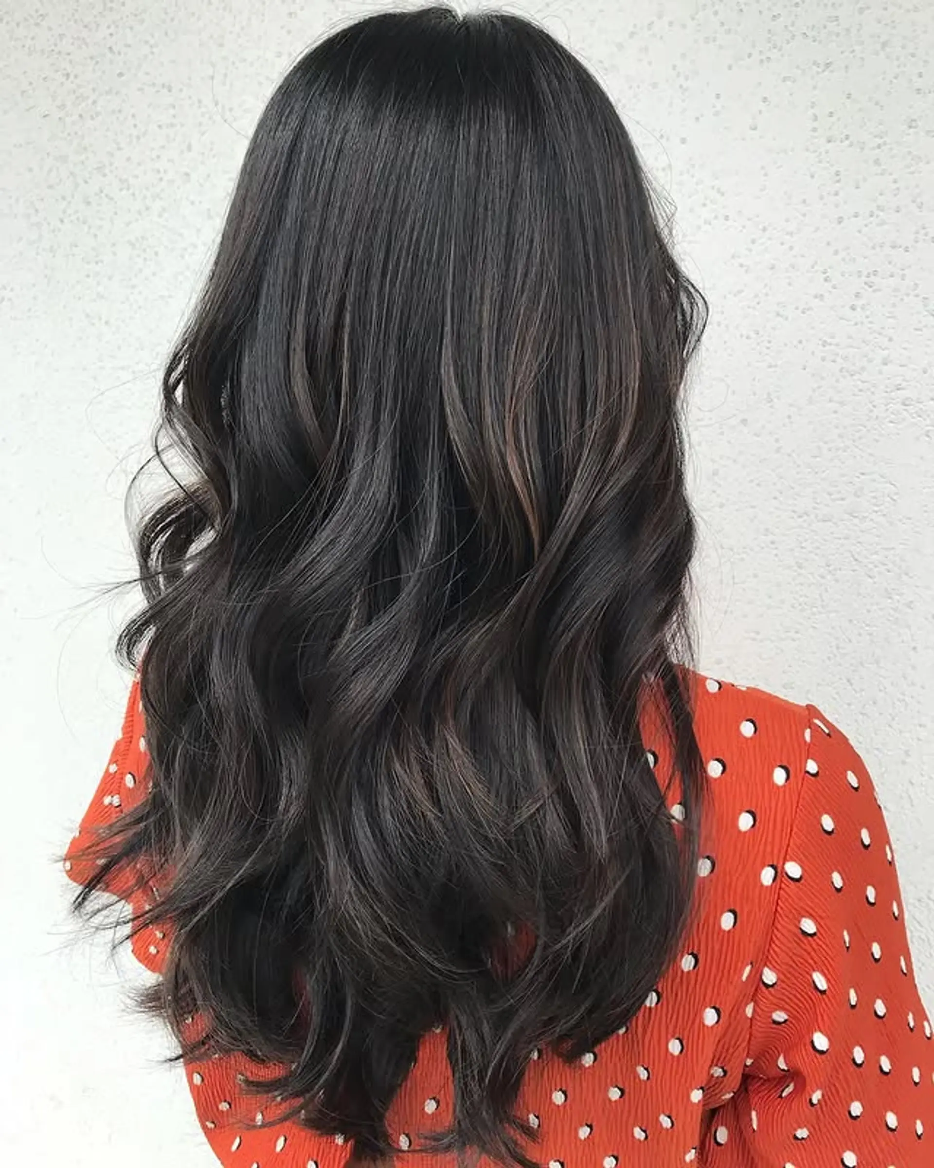 Long wavy hair with a subtle balayage. 1