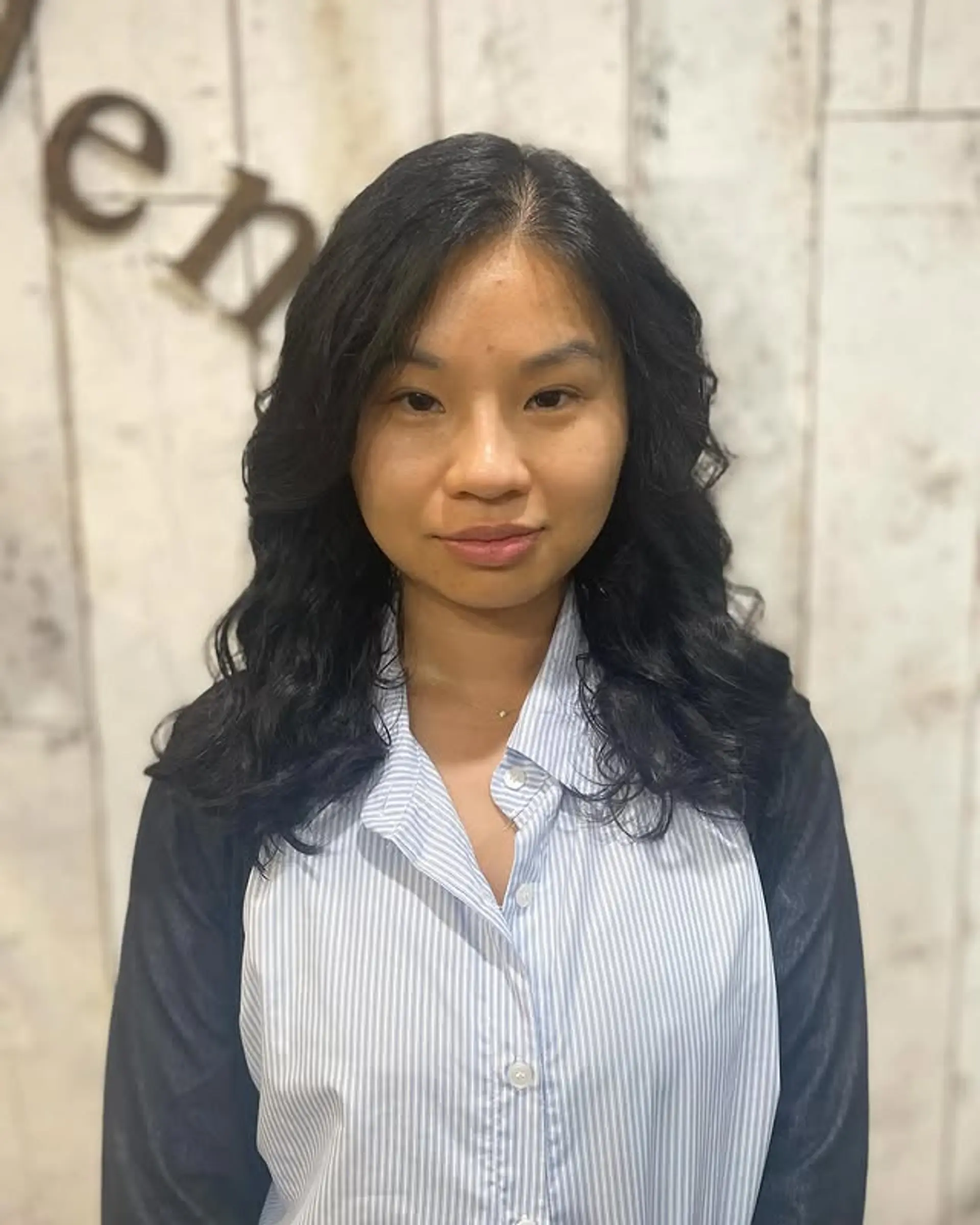 A long, wavy hairstyle with layers to enhance movement and shape. 1