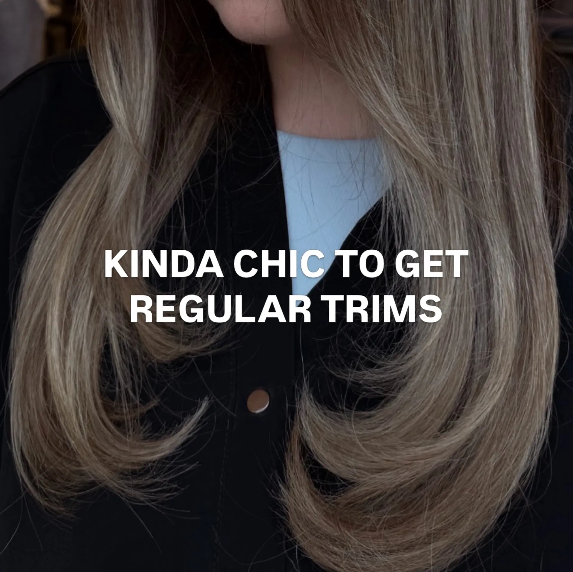 Long layered hair with subtle dimensional highlights, styled with polished inward-curled ends. 1