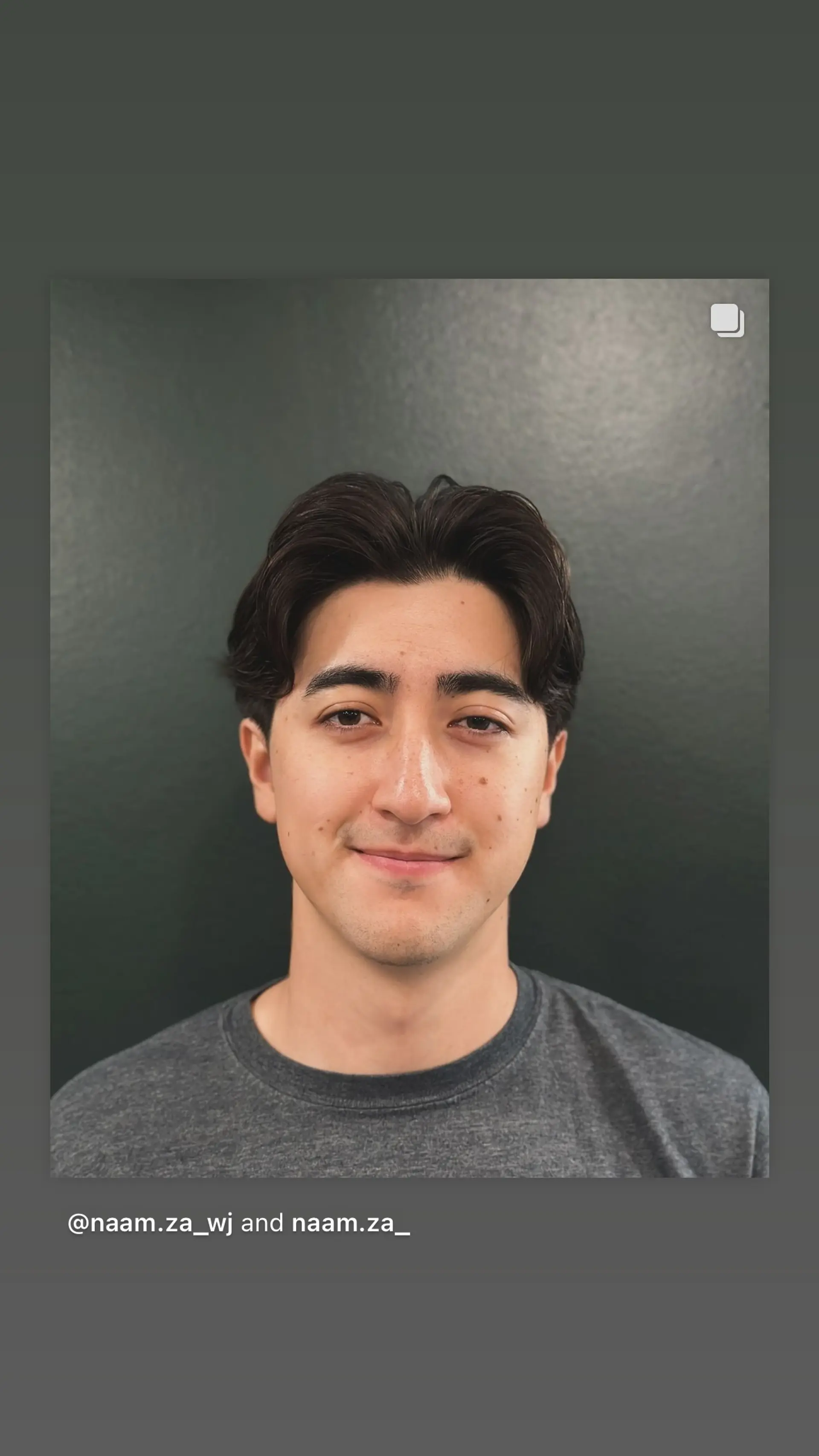 A modern take on the classic curtain cut, featuring a middle part and subtle waves for a trendy, low-maintenance look. 1