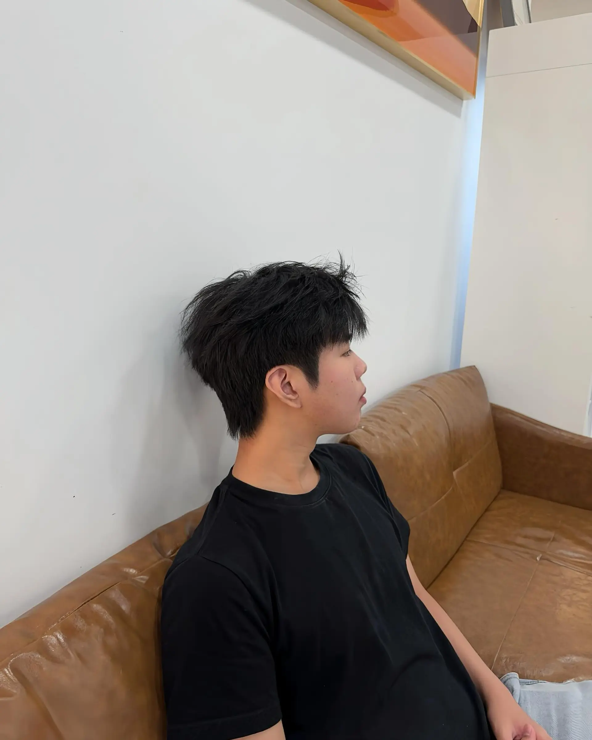 A short, textured crop with tapered sides and a messy finish. 2