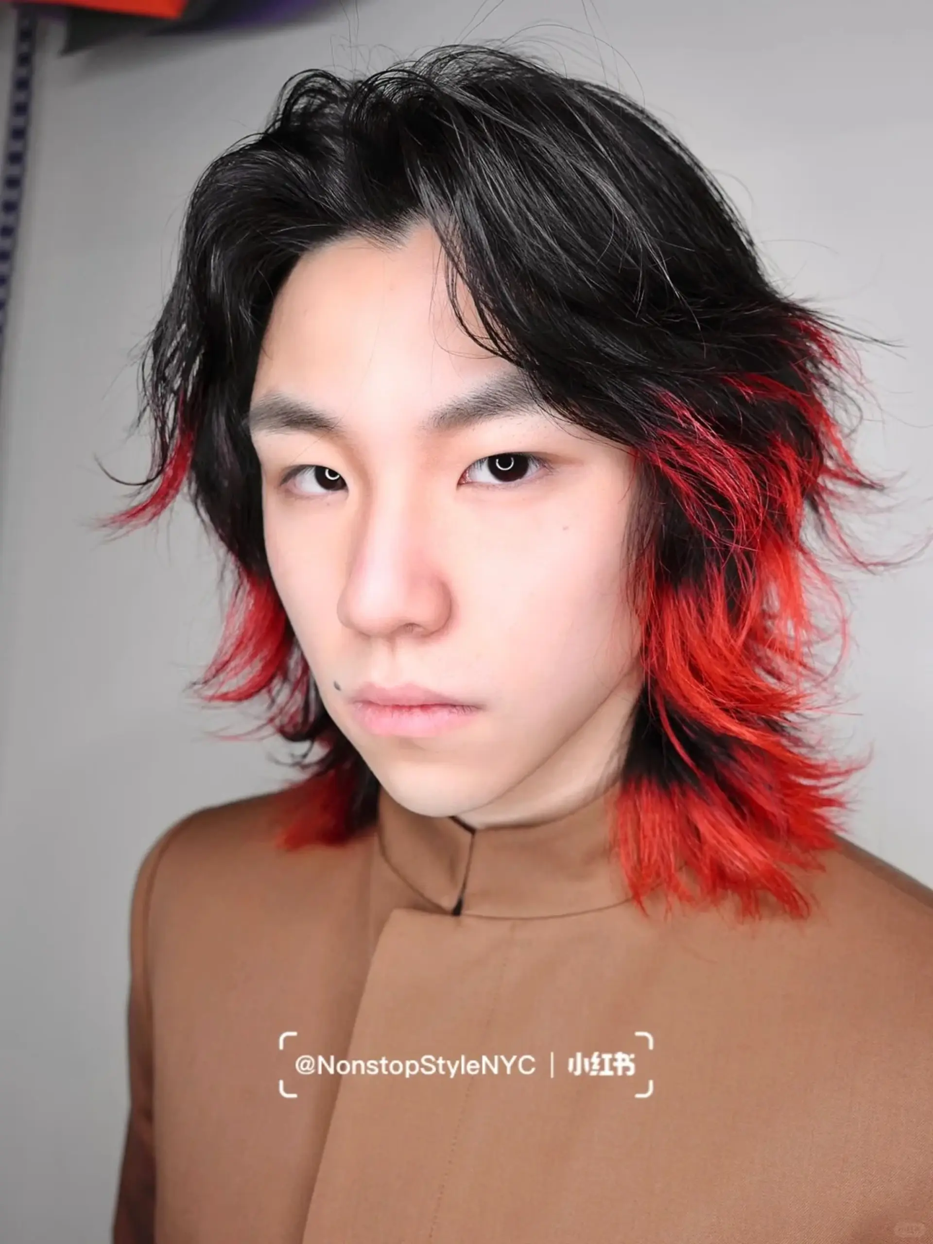 This medium-length, wavy hairstyle features a dramatic two-tone color scheme with predominant black hair and vivid red tips. Designed with shaggy layers cascading around the head, this style delivers a rebellious and edgy vibe.

(NonstopStyle: by Hiro) 2
