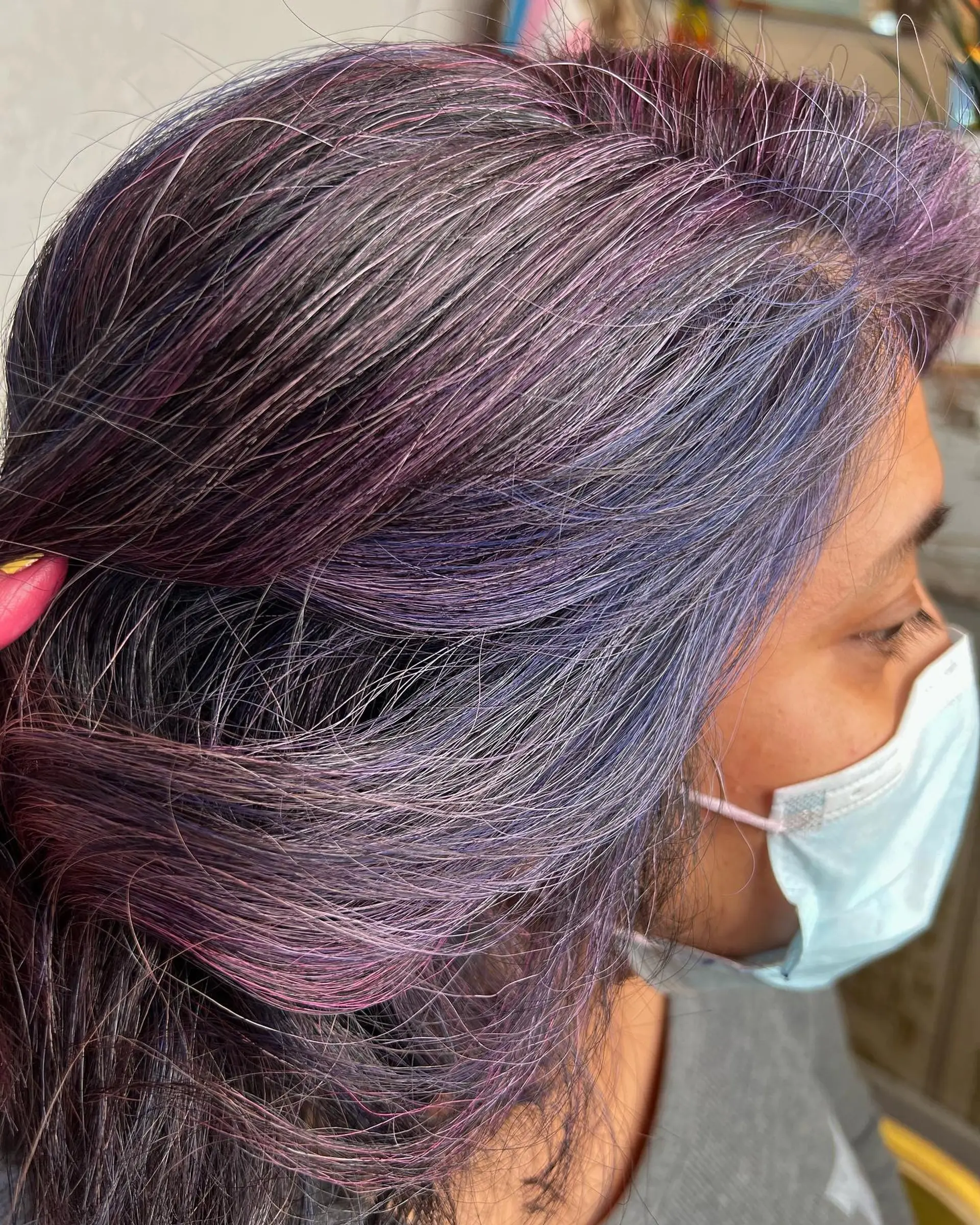 Features a vibrant mix of purple and pink highlights blended into gray-black hair, creating a dreamy and eye-catching style. 1