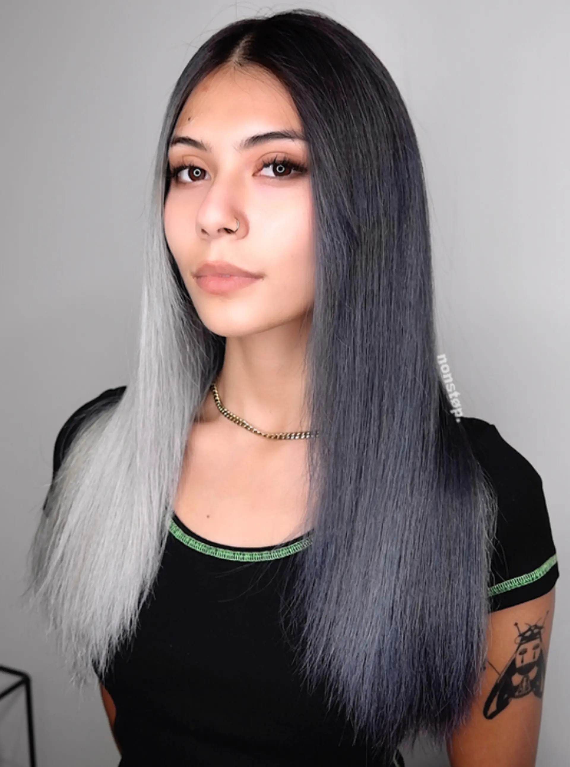 A long, straight hairstyle featuring a transition from black roots to white tips, creating a sharp color contrast.
(NonstopStyle: by Kelvin) 2