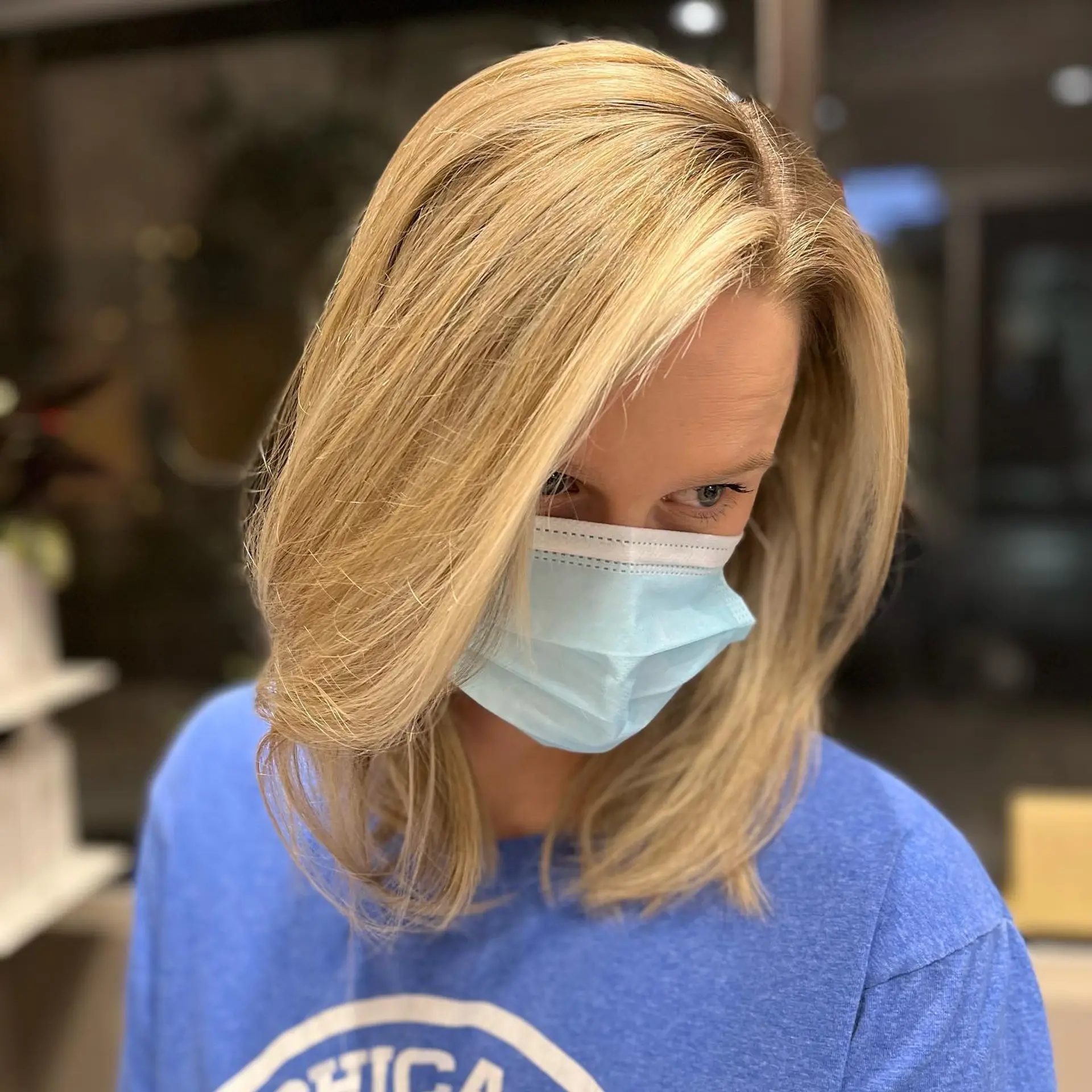 A blonde balayage lob with subtle layers and a beachy wave. 1