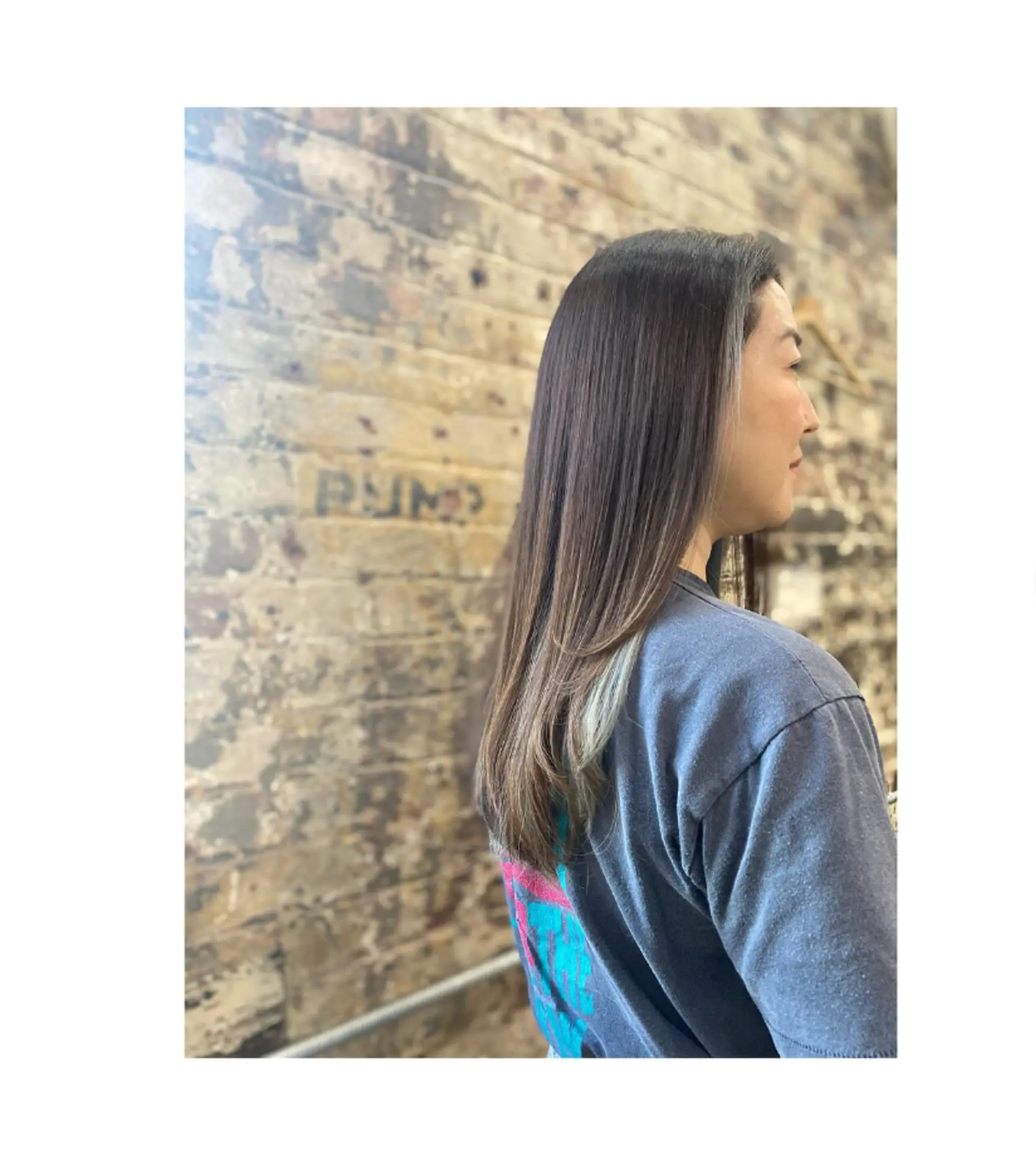 A sleek, medium-length layered haircut with a face-framing money piece. 1