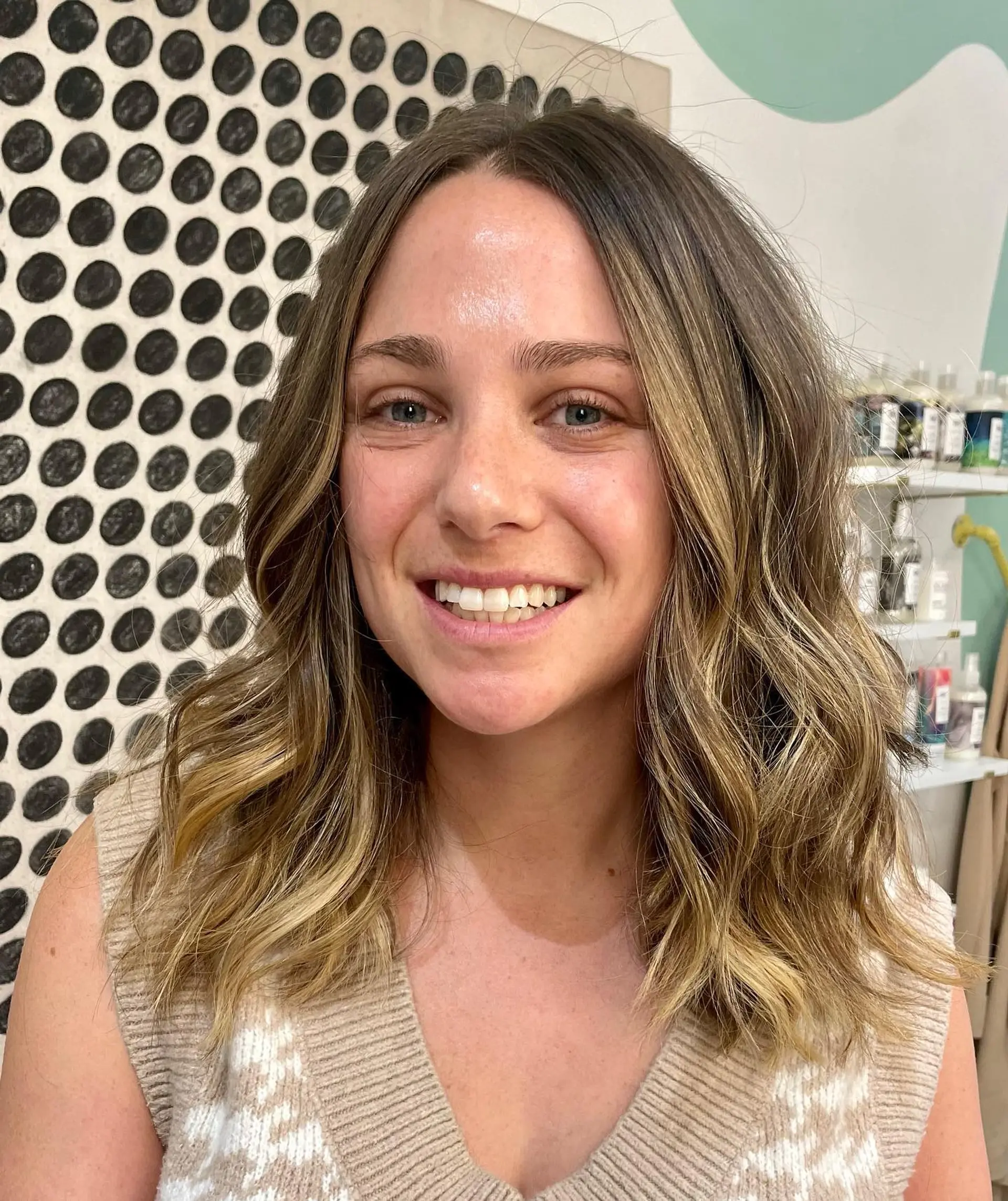 Bronde balayage with beachy waves. 1