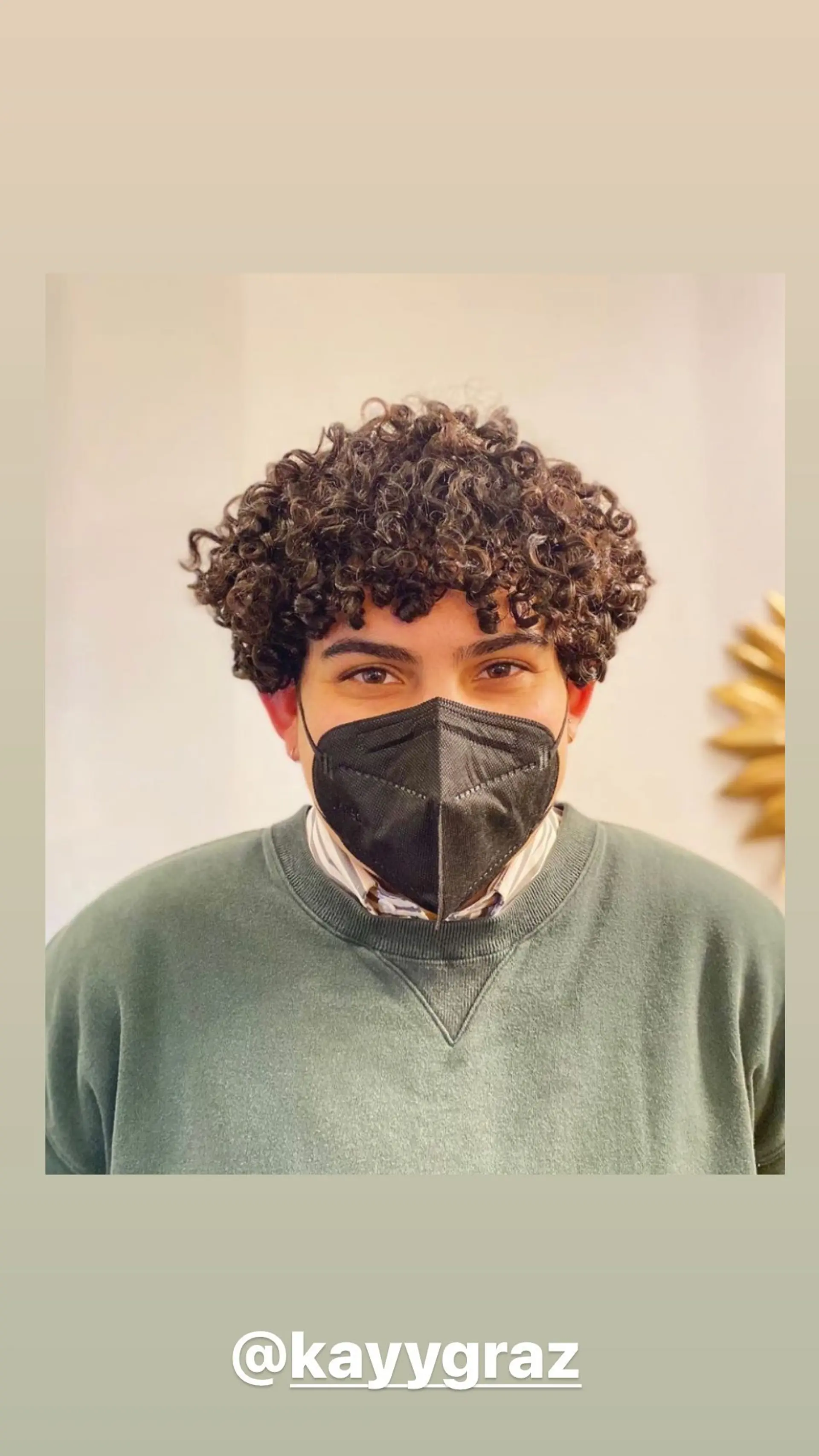 A short afro with defined, bouncy curls. 1