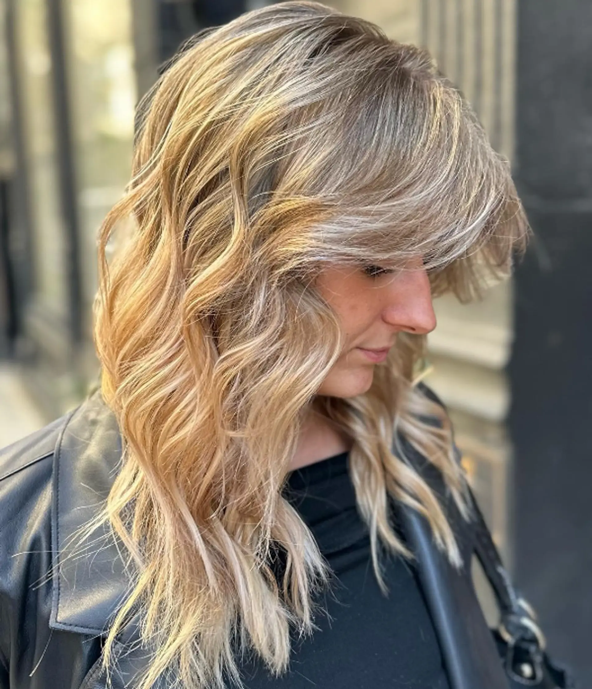 Medium-length, golden blonde hair with soft waves, layered texture, face-framing strands, and a natural shine.

Color by @simabeautynyc
Cut and style by @juliamannino_hair
 2