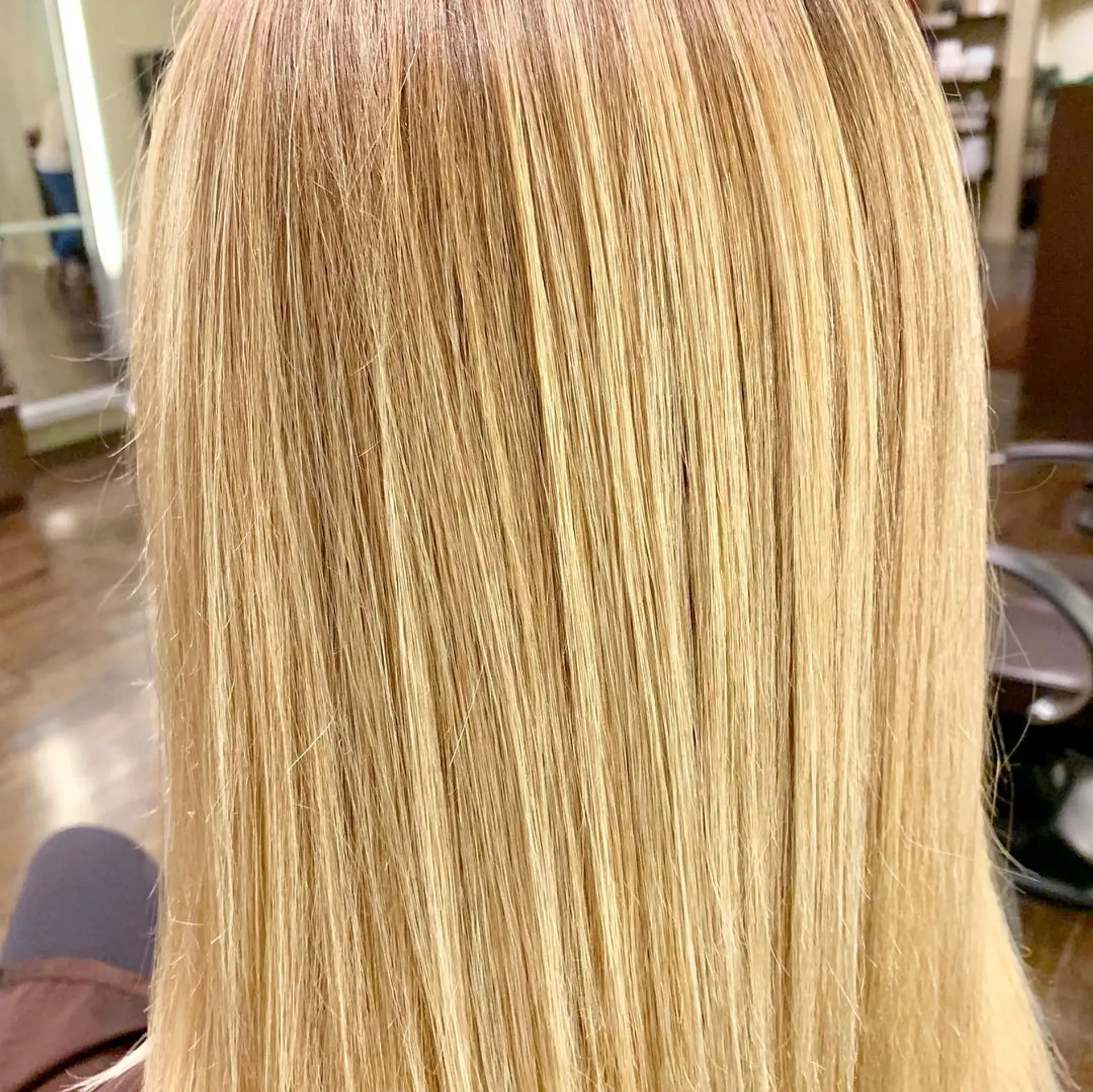 Long straight hair with a golden blonde balayage. 2