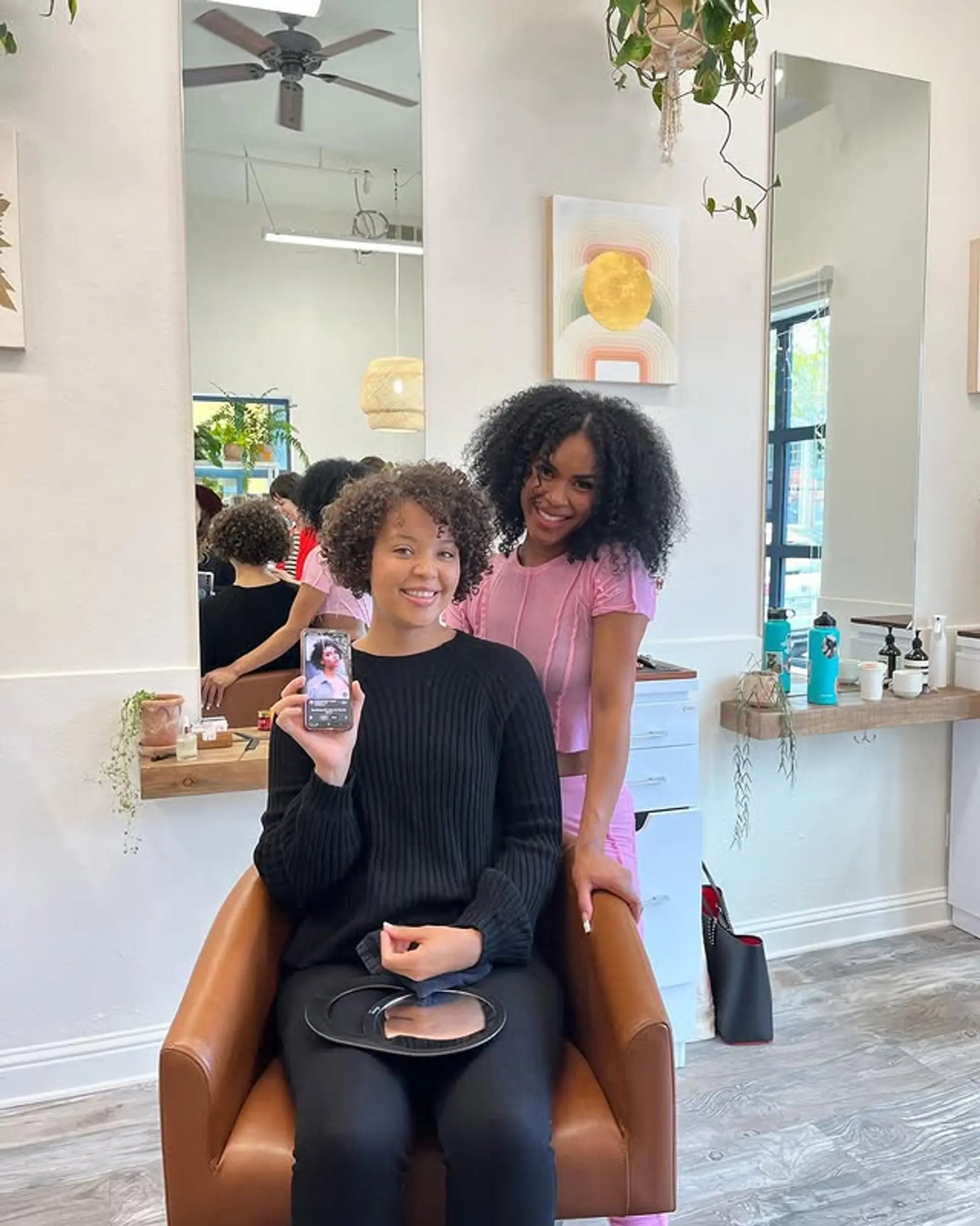 A stylish curly bob with added highlights to accentuate texture. 1