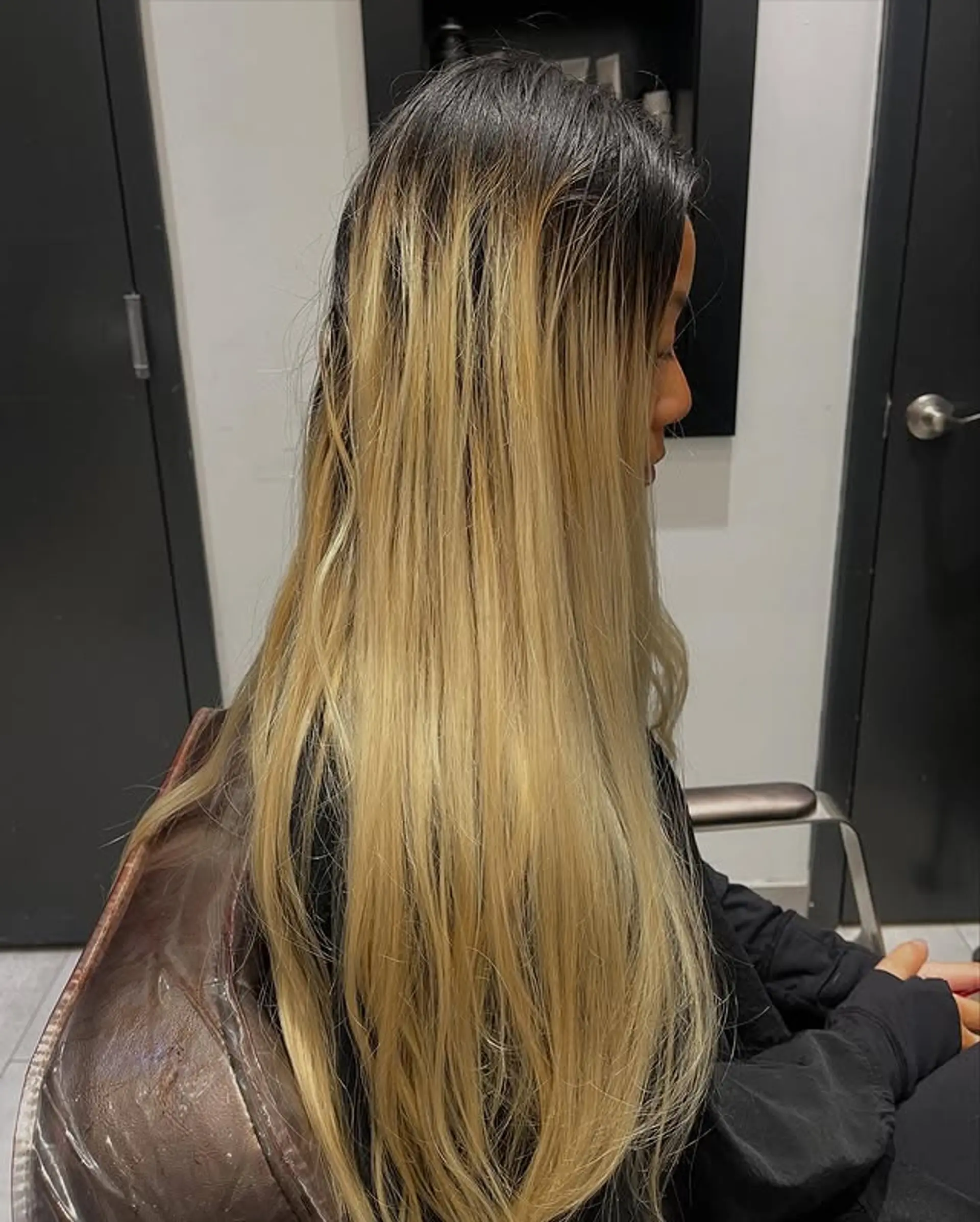 Balayage with a black root fading into a light blonde color. 1