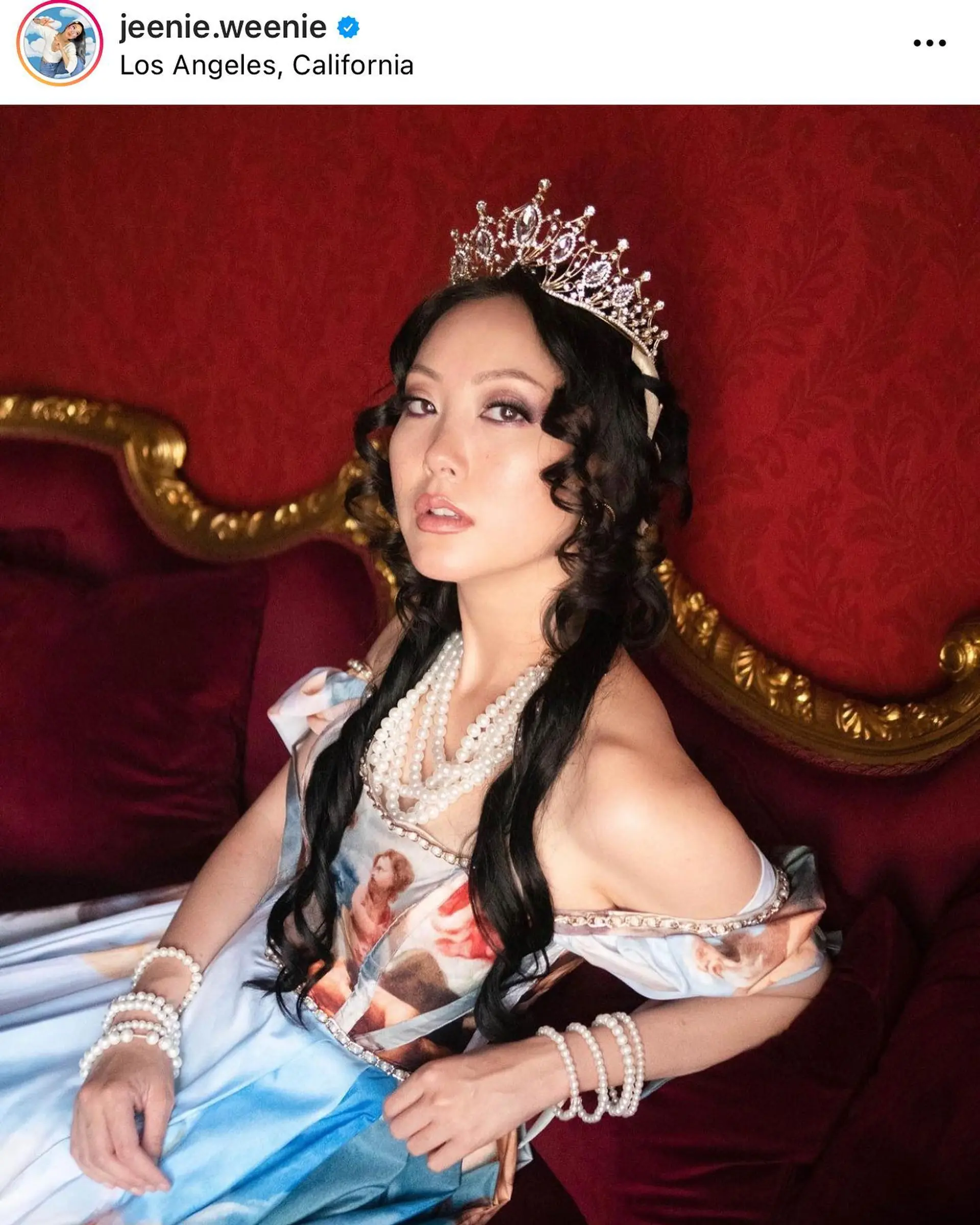 Romantic cascading long dark hair styled with defined curls, face-framing ringlets, and an ornate crown. 1