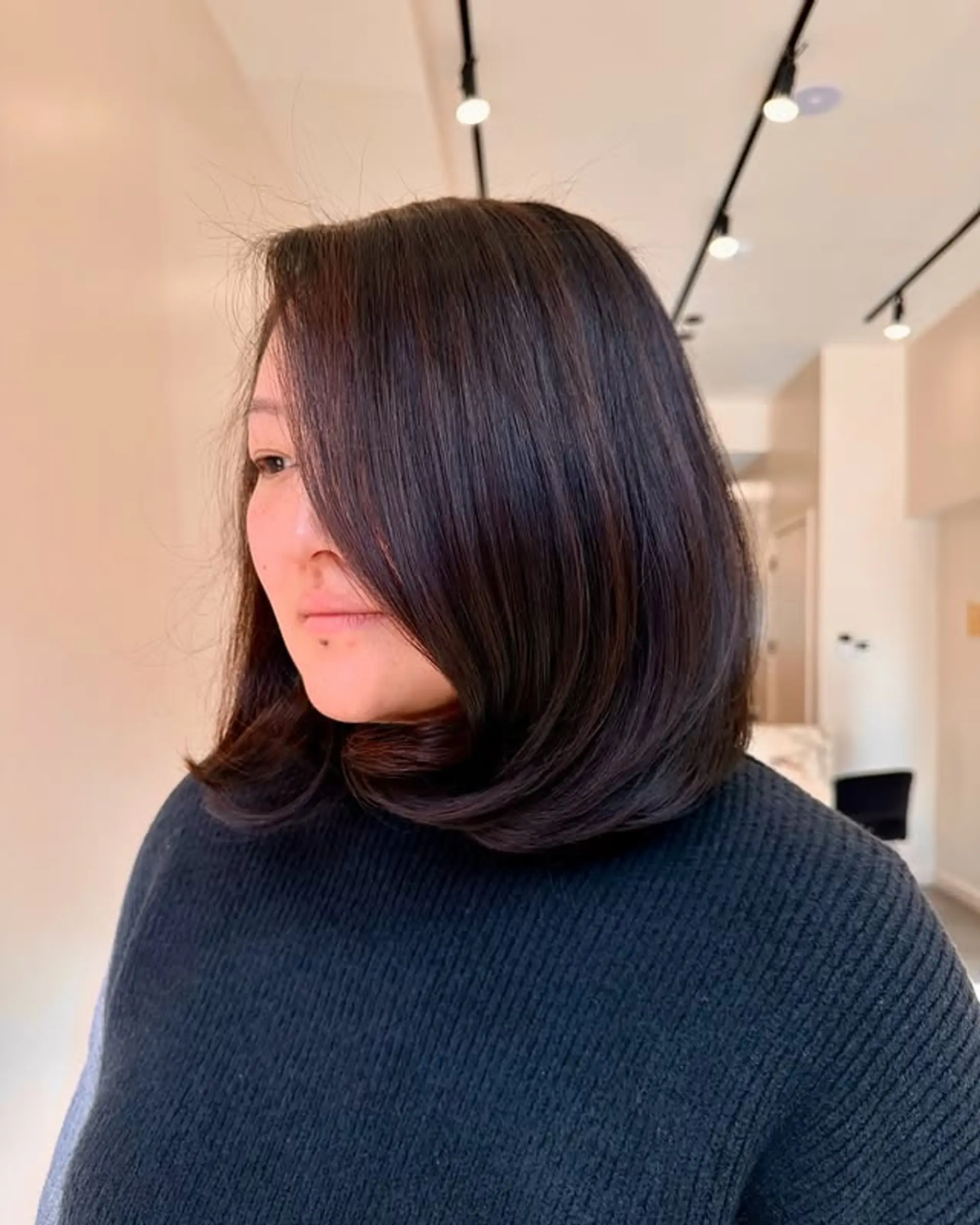 A chin-length bob with soft layers for added movement and a polished look. 1