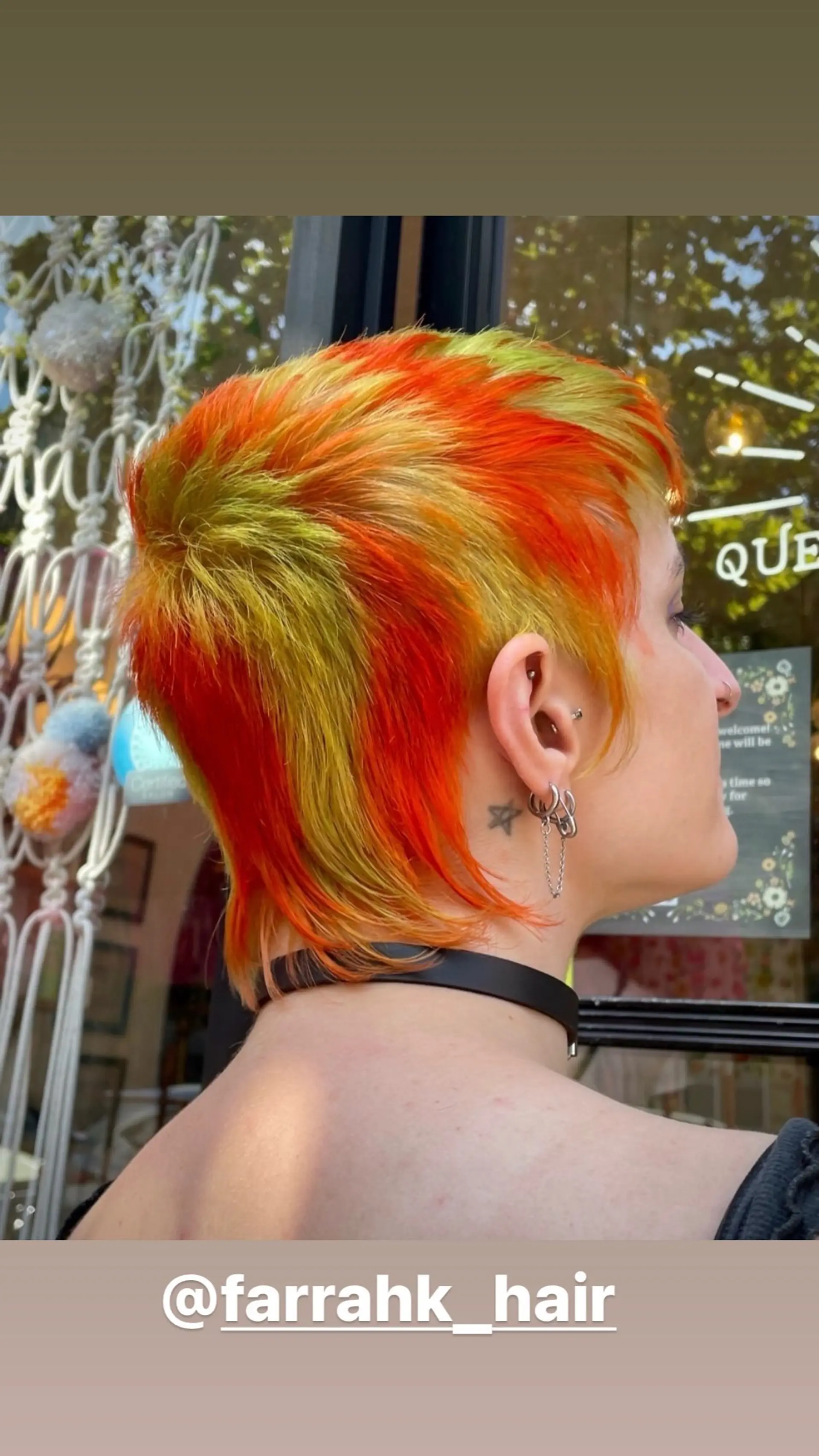 A short, shaggy mullet with a textured finish and bold, vibrant color. 1